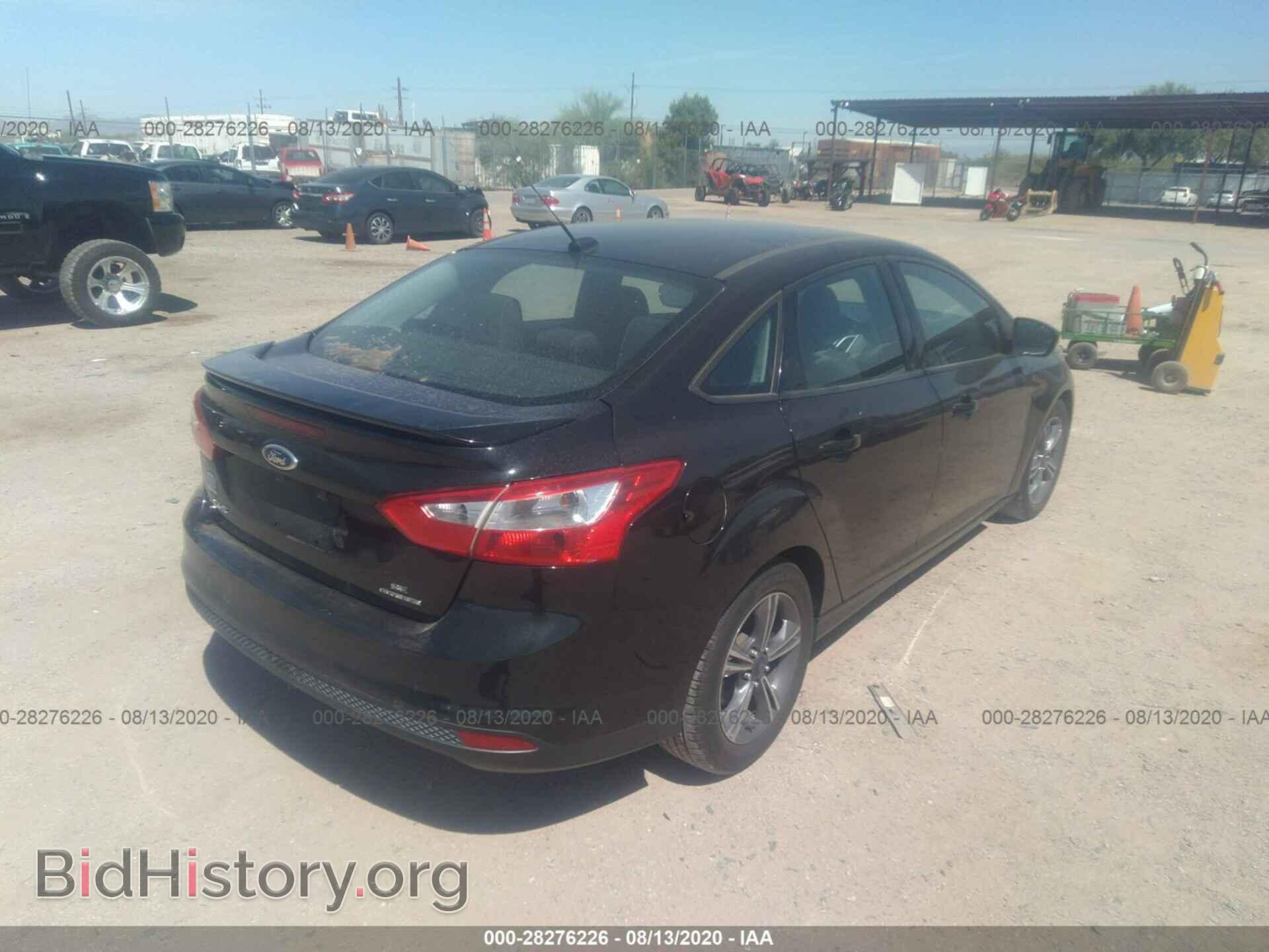 2014 FORD FOCUS - VIN: 1FADP3F2XEL340629 - Photo 4