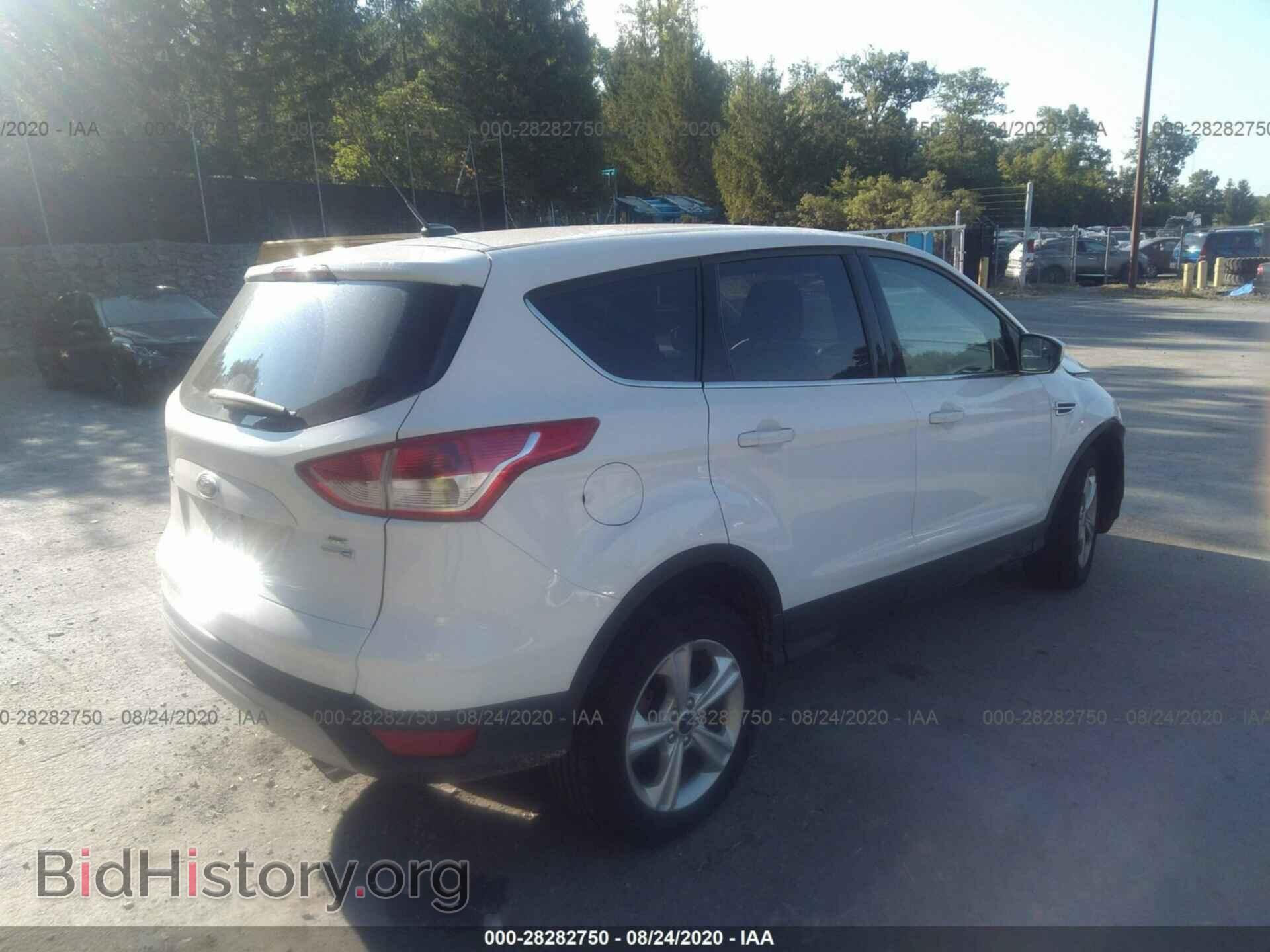 2014 FORD ESCAPE - VIN: 1FMCU9GX4EUE28562 - Photo 4