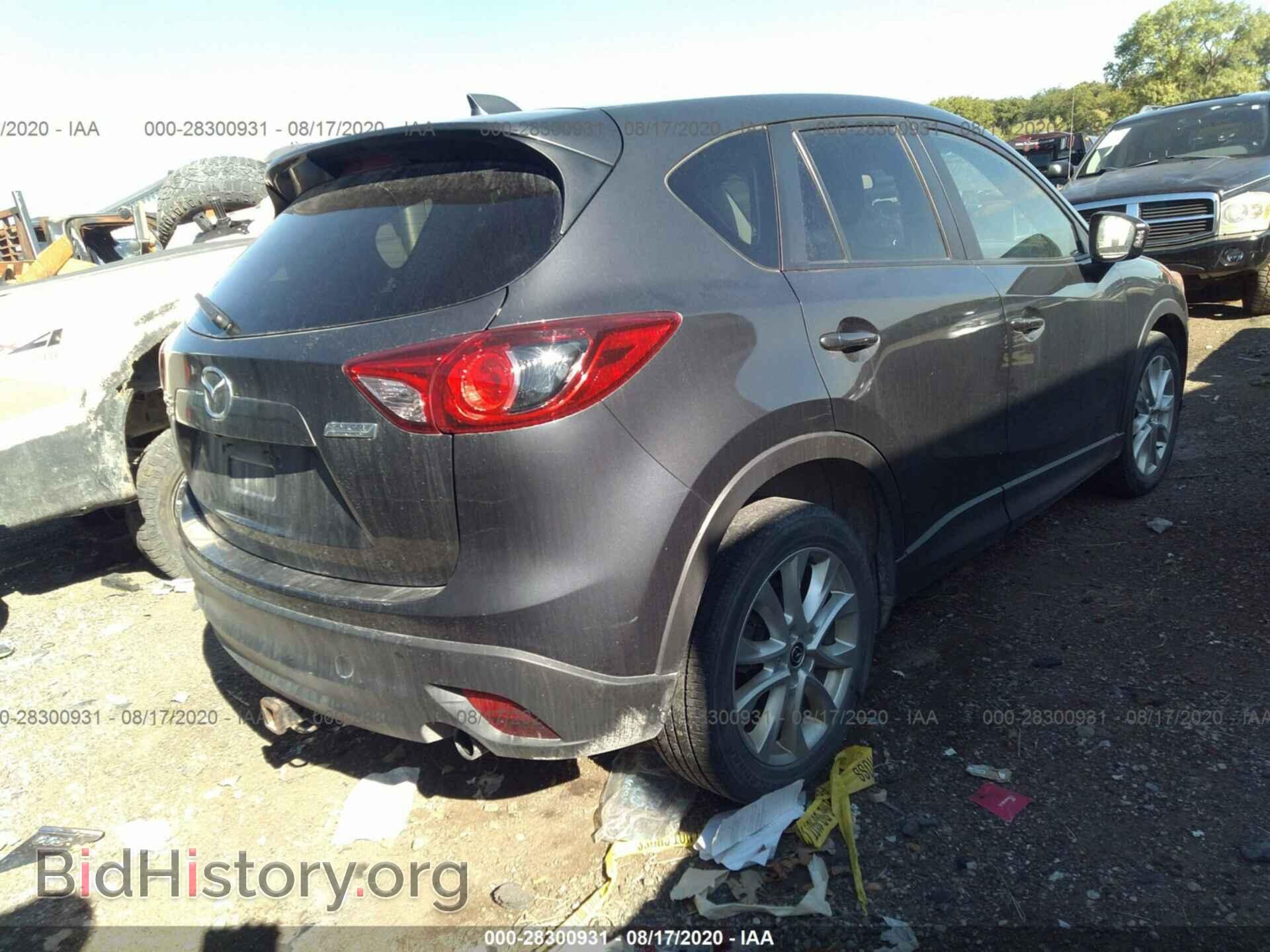 2014 MAZDA CX-5 - VIN: JM3KE4DY0E0302520 - Фото 4