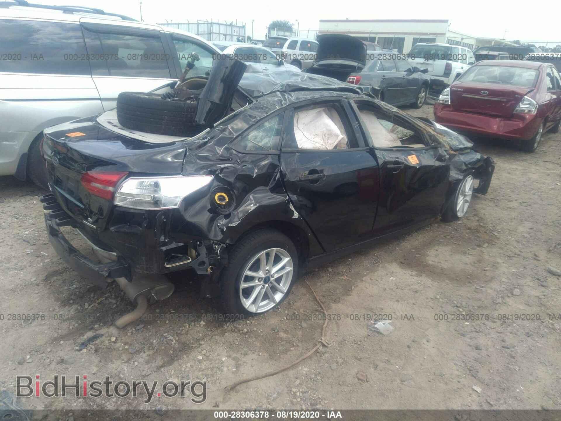 2016 FORD FOCUS - VIN: 1FADP3F20GL381628 - Photo 4