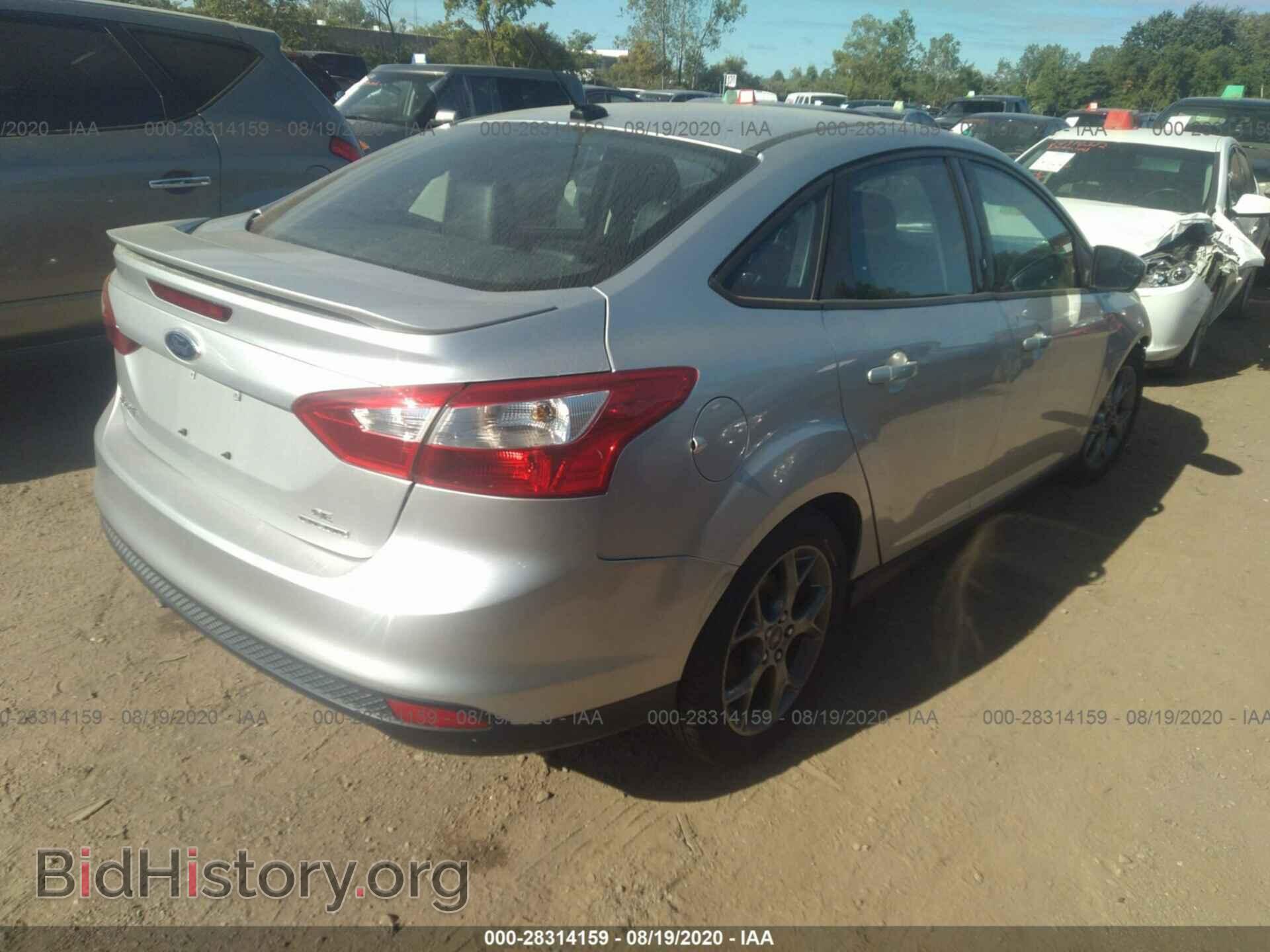 2014 FORD FOCUS - VIN: 1FADP3F29EL122567 - Photo 4