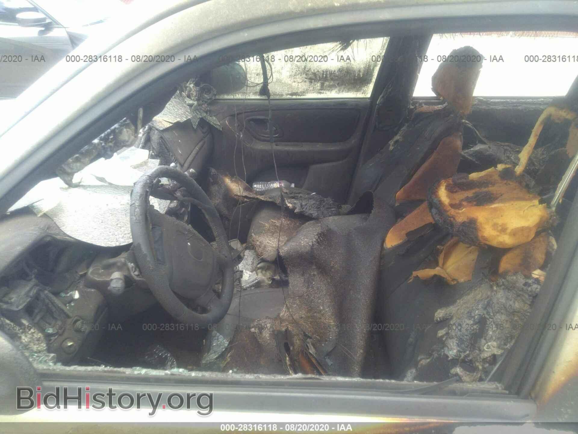2004 MAZDA TRIBUTE - VIN: 4F2CZ06154KM32595 - Photo 5