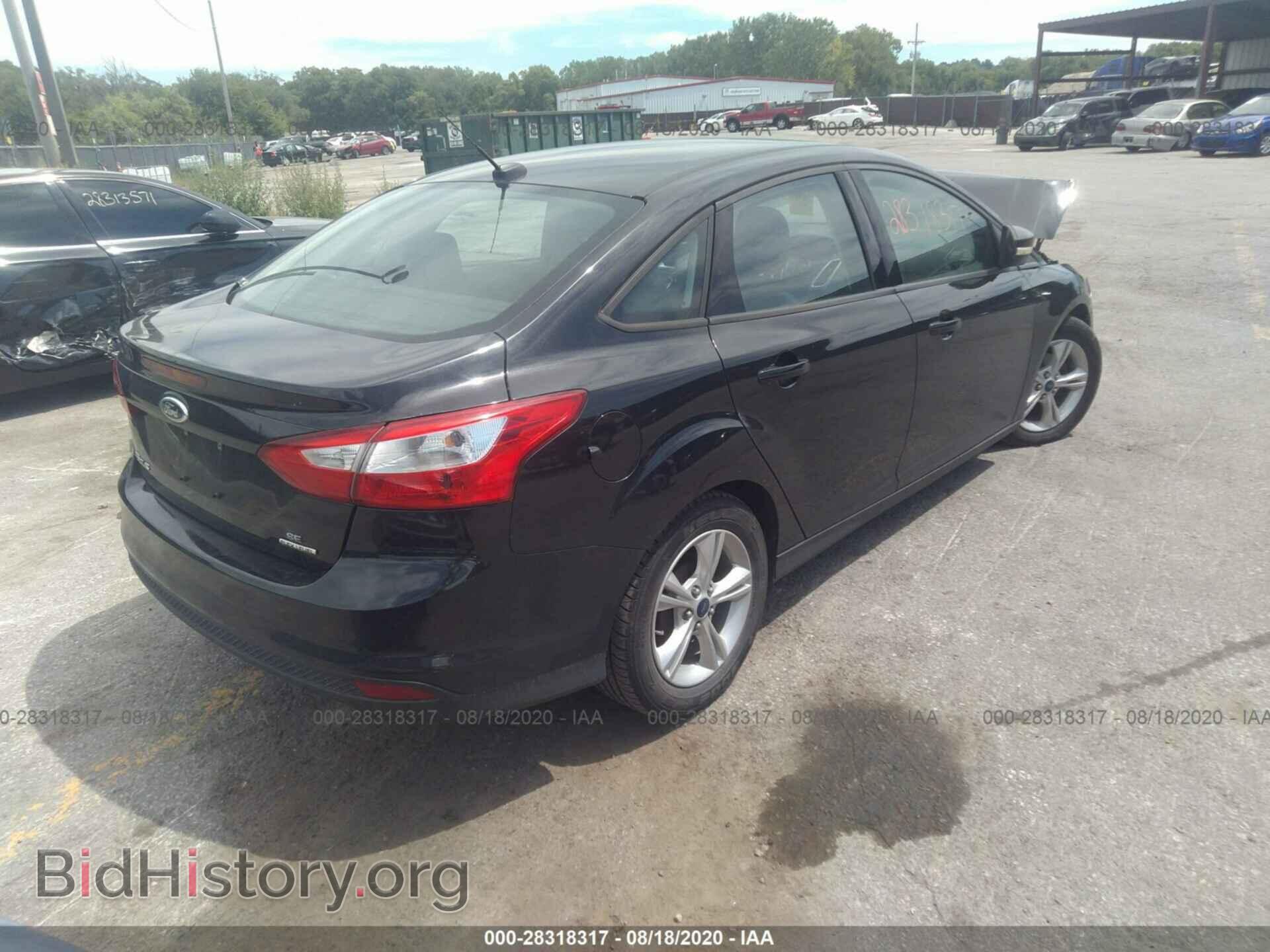 2014 FORD FOCUS - VIN: 1FADP3F2XEL349640 - Photo 4