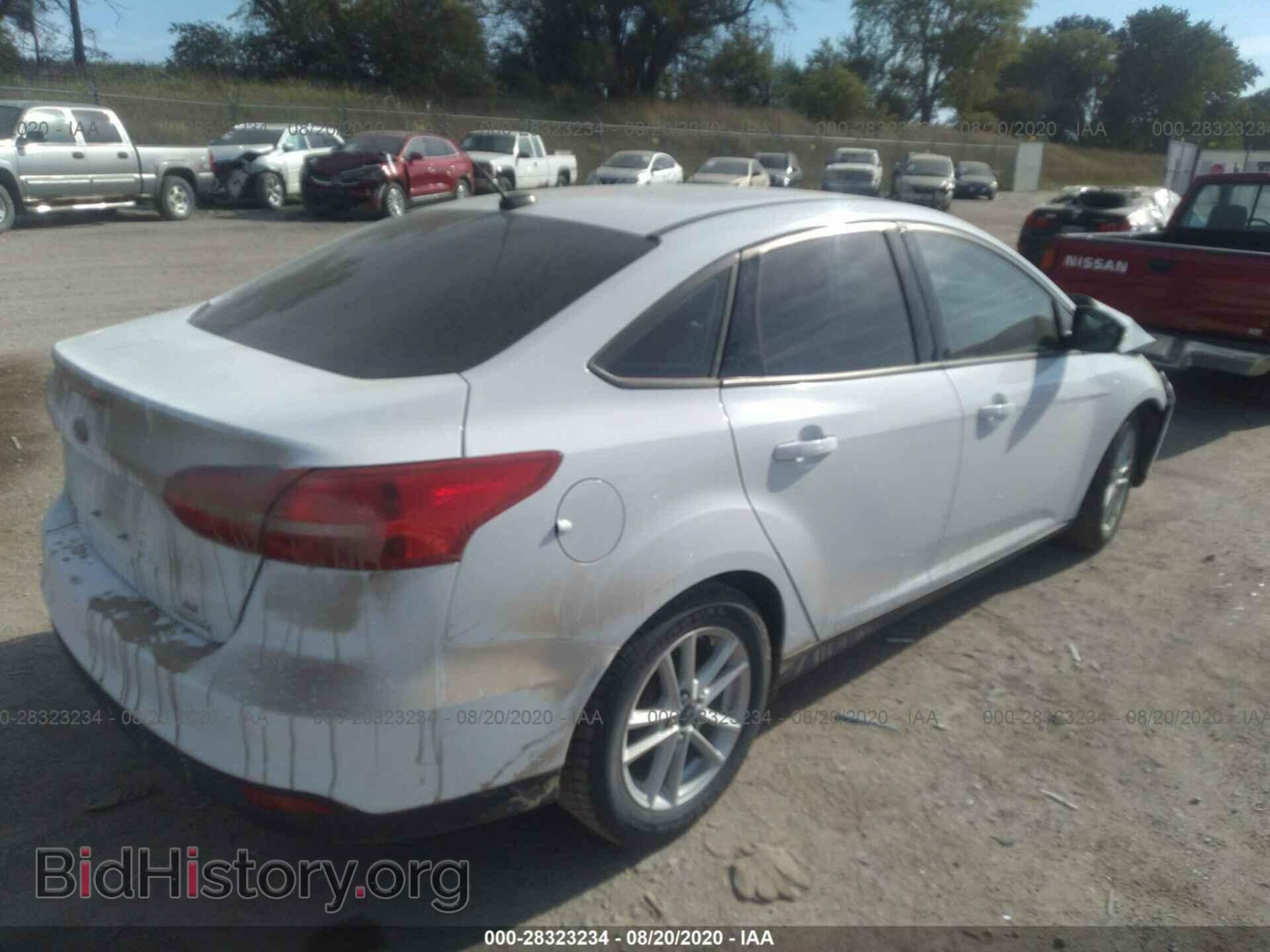 2015 FORD FOCUS - VIN: 1FADP3F20FL299901 - Photo 4