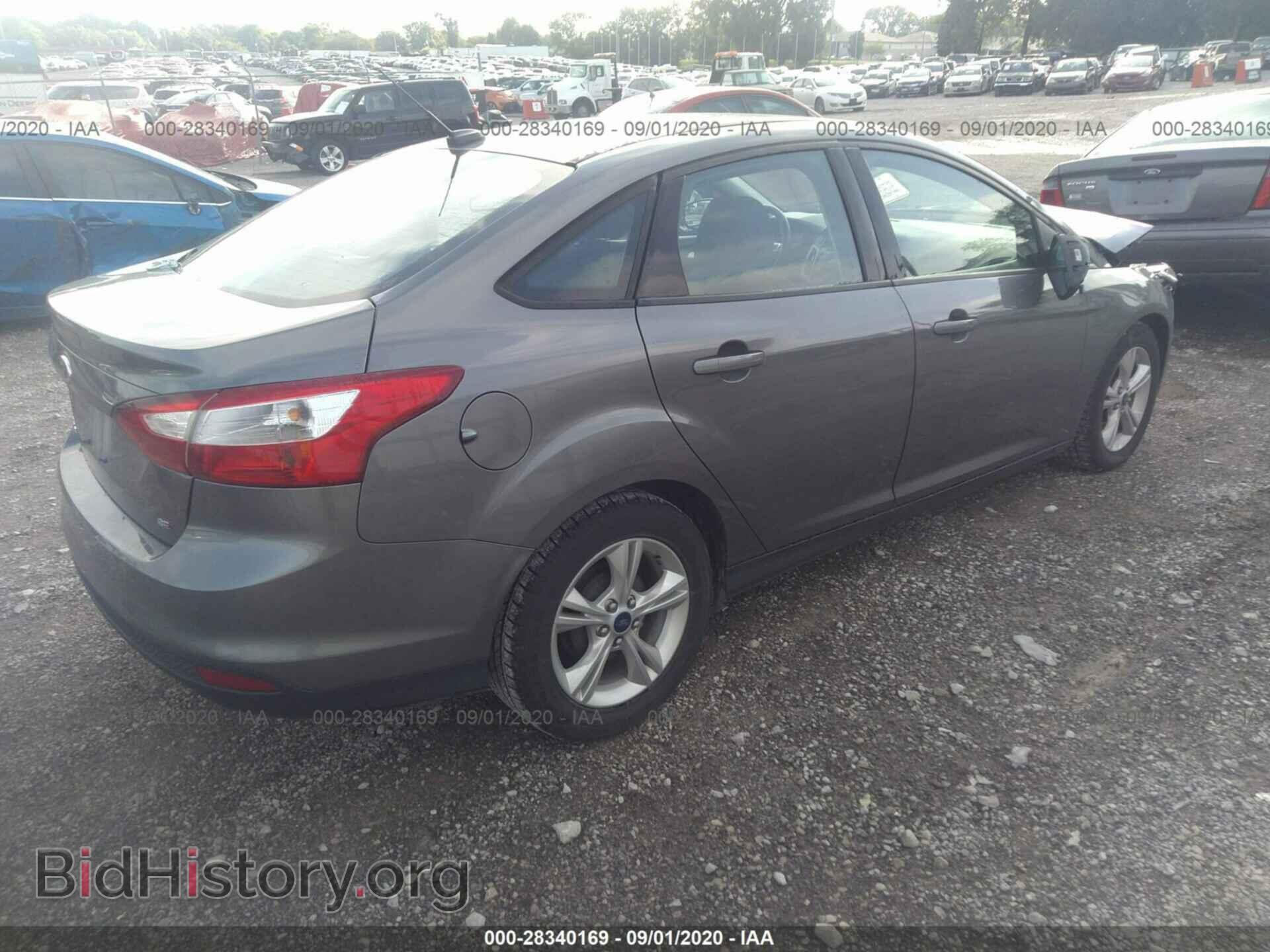 2014 FORD FOCUS - VIN: 1FADP3F25EL388569 - Photo 4