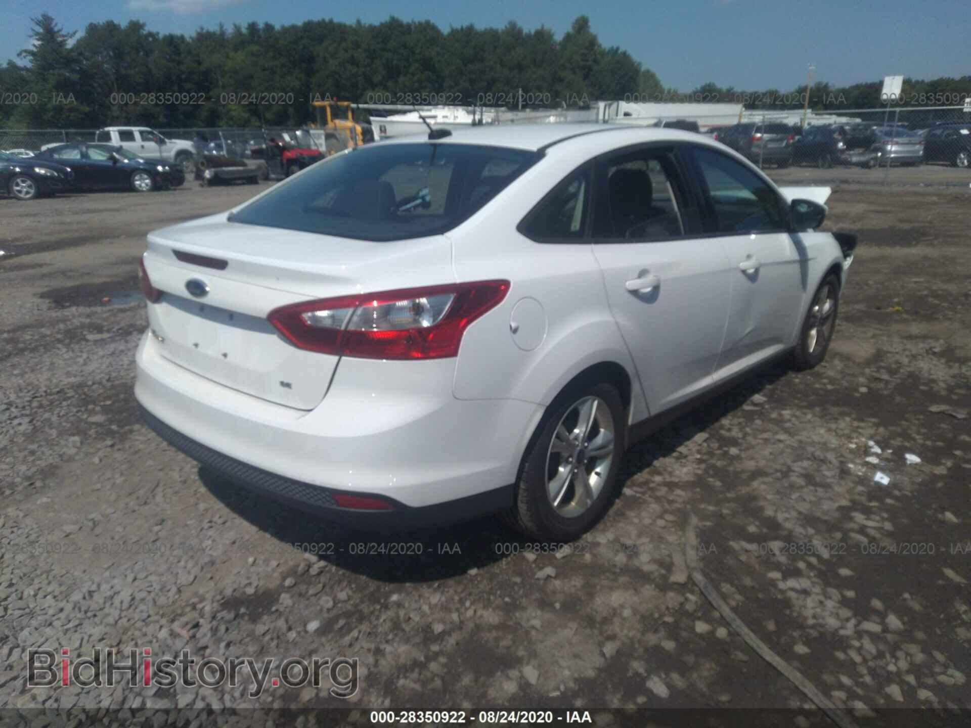 2014 FORD FOCUS - VIN: 1FADP3F21EL201490 - Photo 4