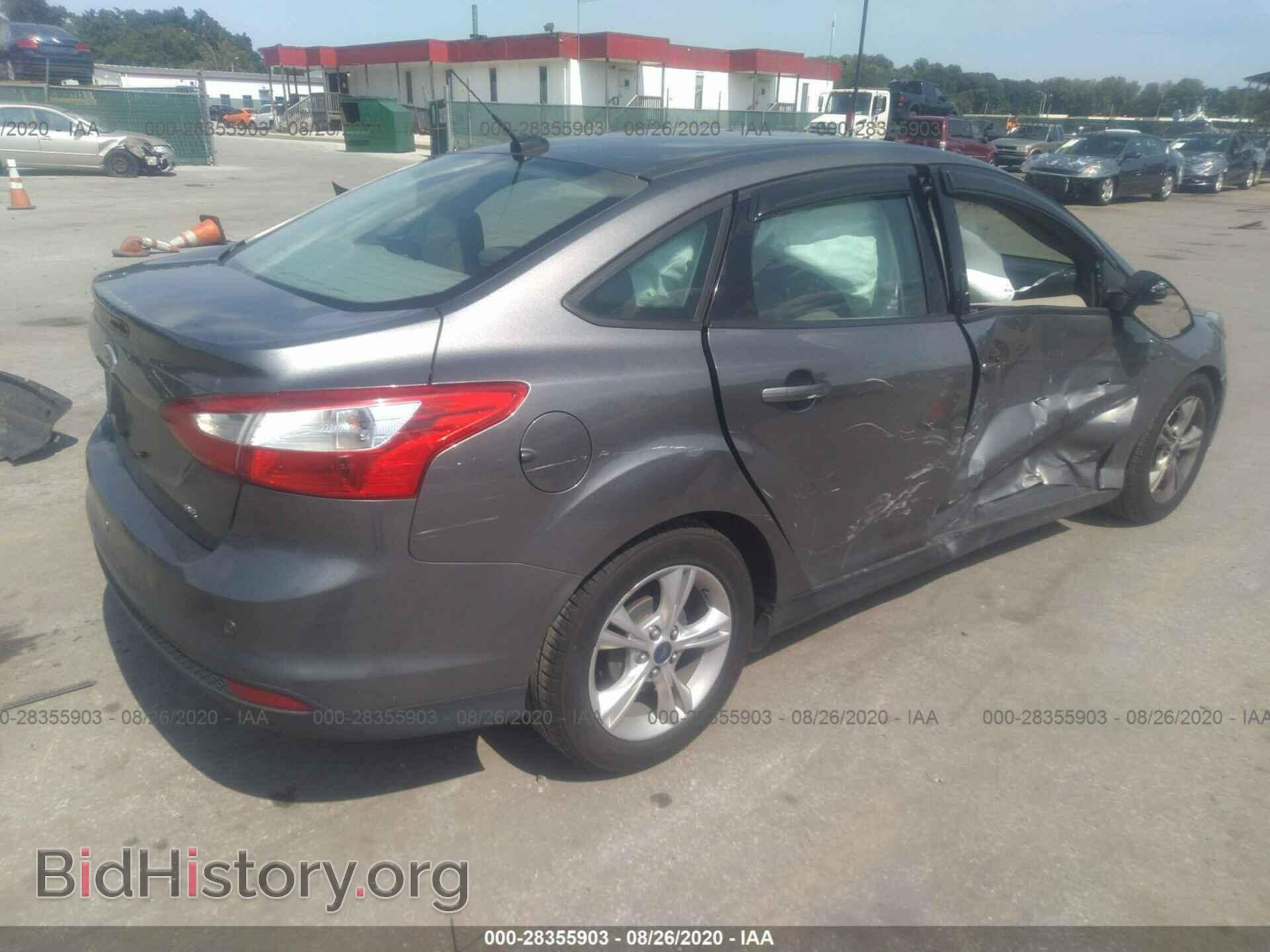 2014 FORD FOCUS - VIN: 1FADP3F20EL268100 - Photo 4