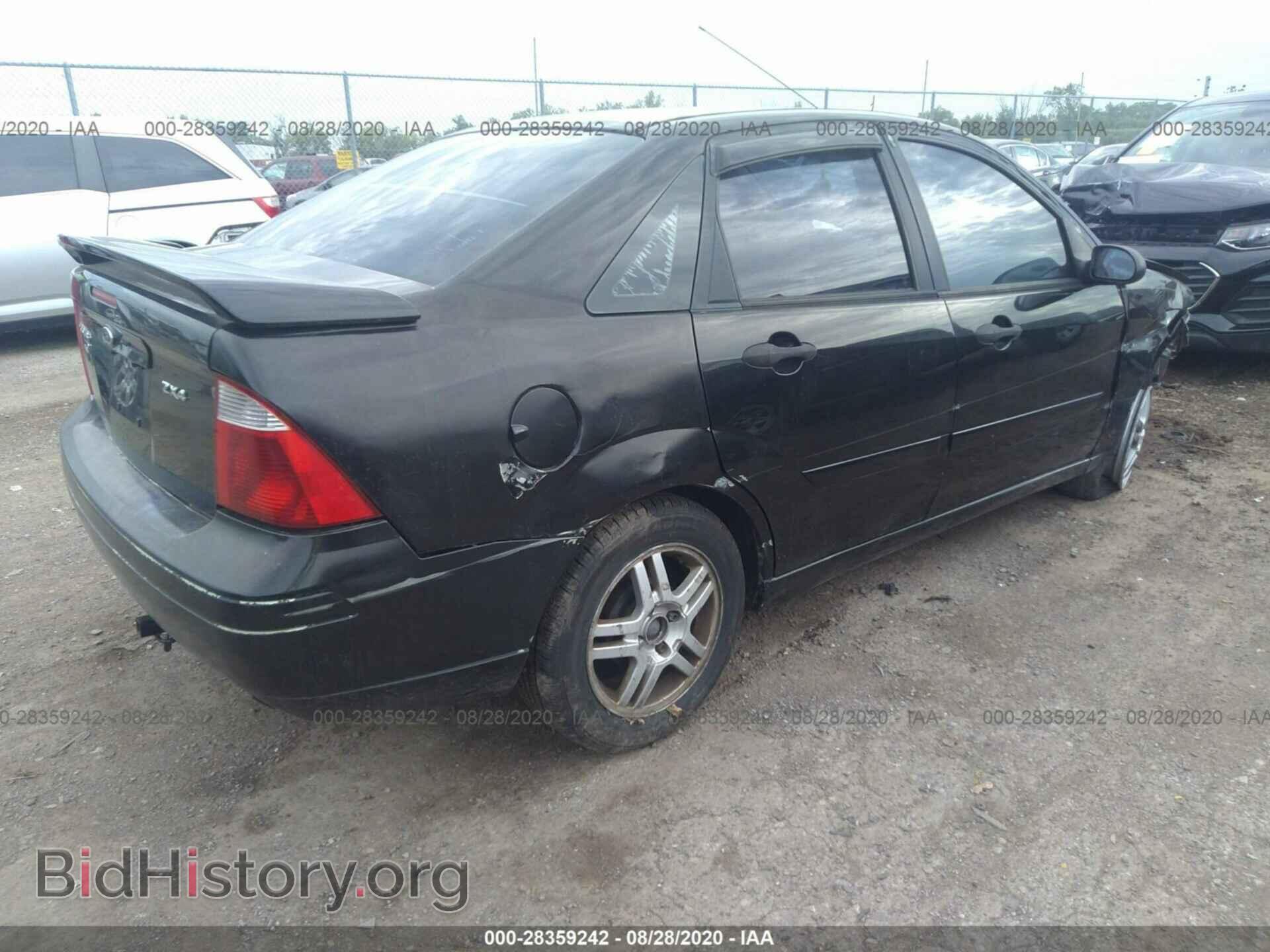 2005 FORD FOCUS - VIN: 1FAFP34N35W302857 - Фото 4