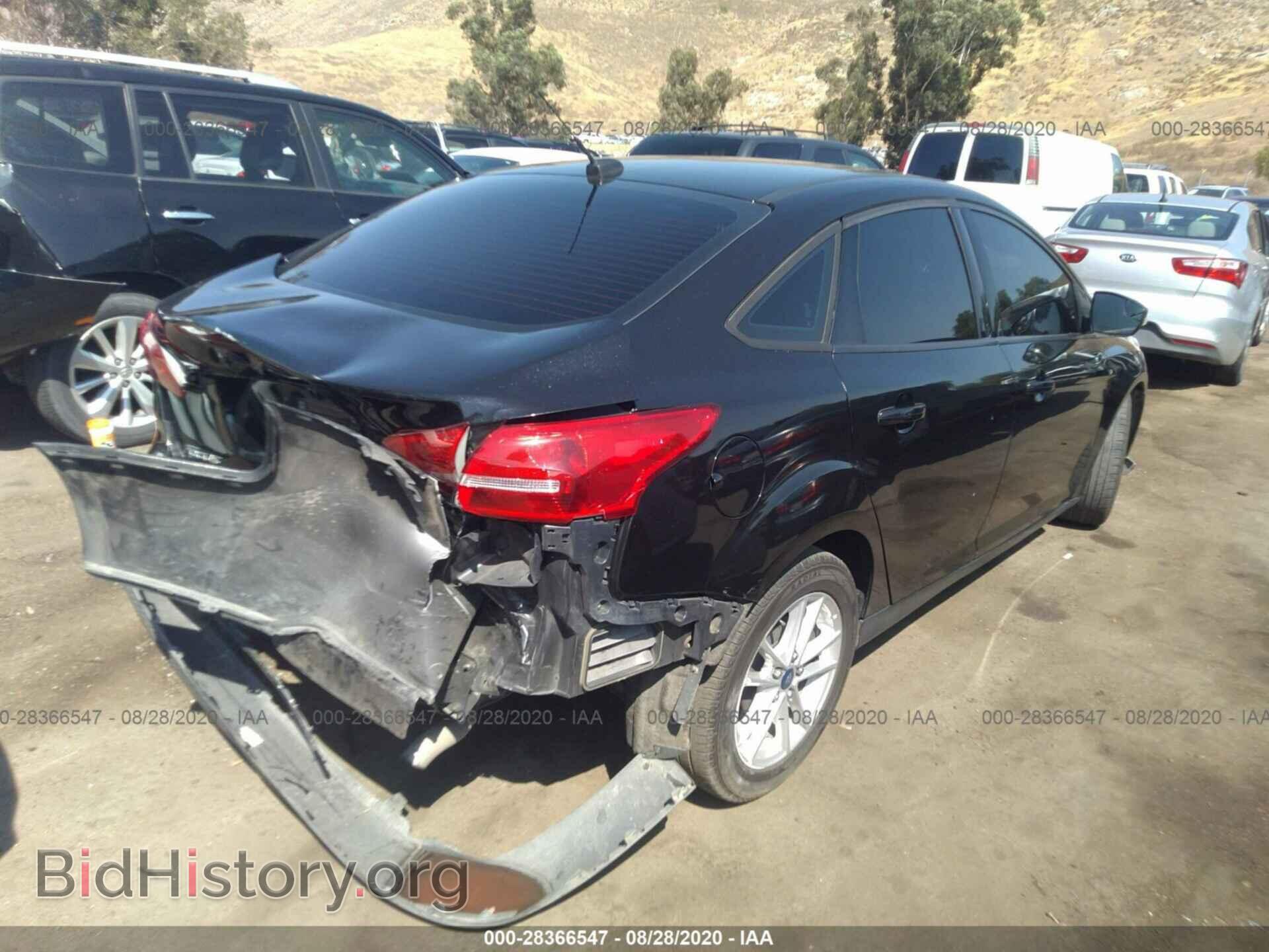 2015 FORD FOCUS - VIN: 1FADP3F21FL262470 - Photo 4