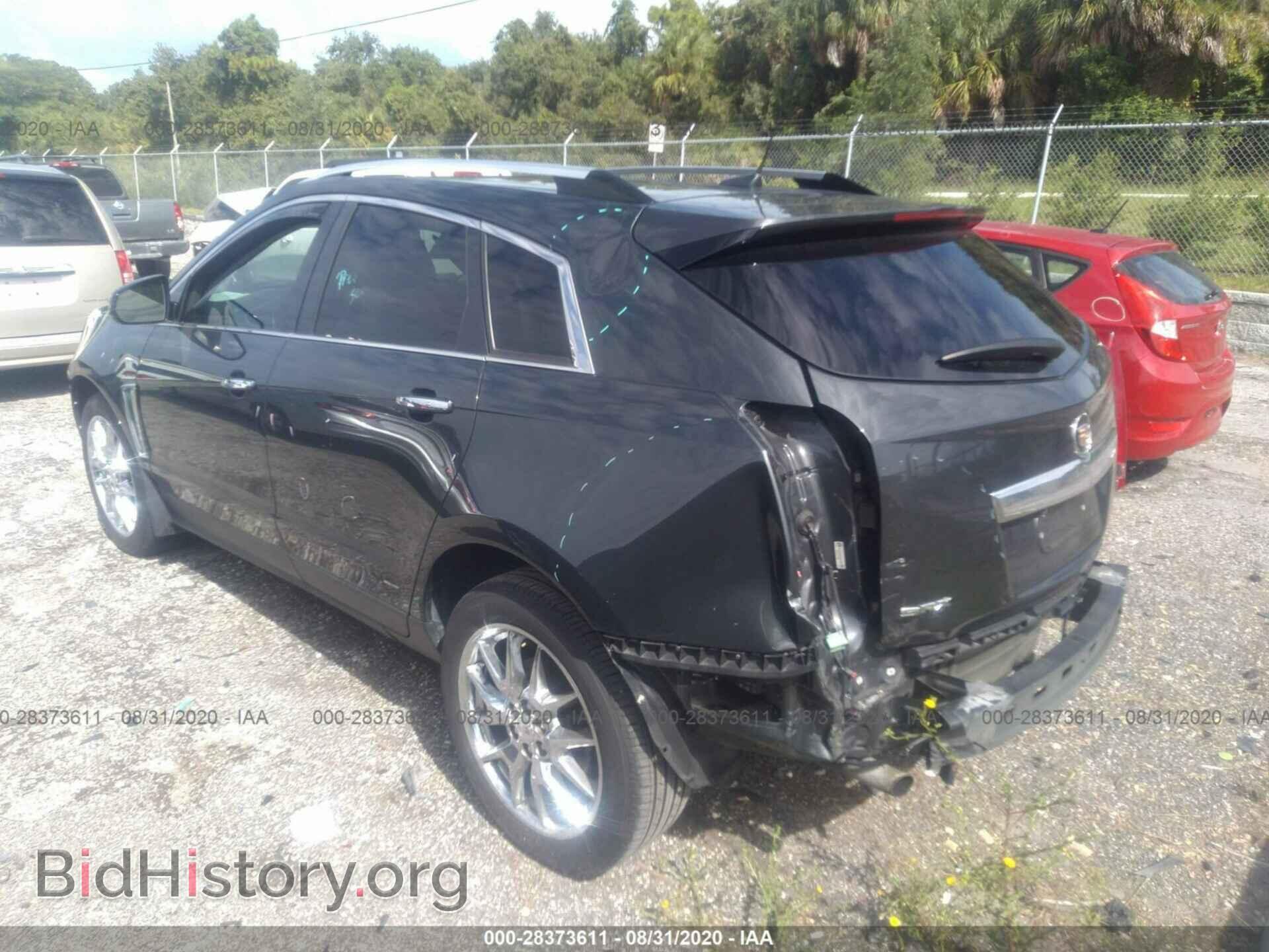 2014 CADILLAC SRX - VIN: 3GYFNCE39ES557208 - Фото 3