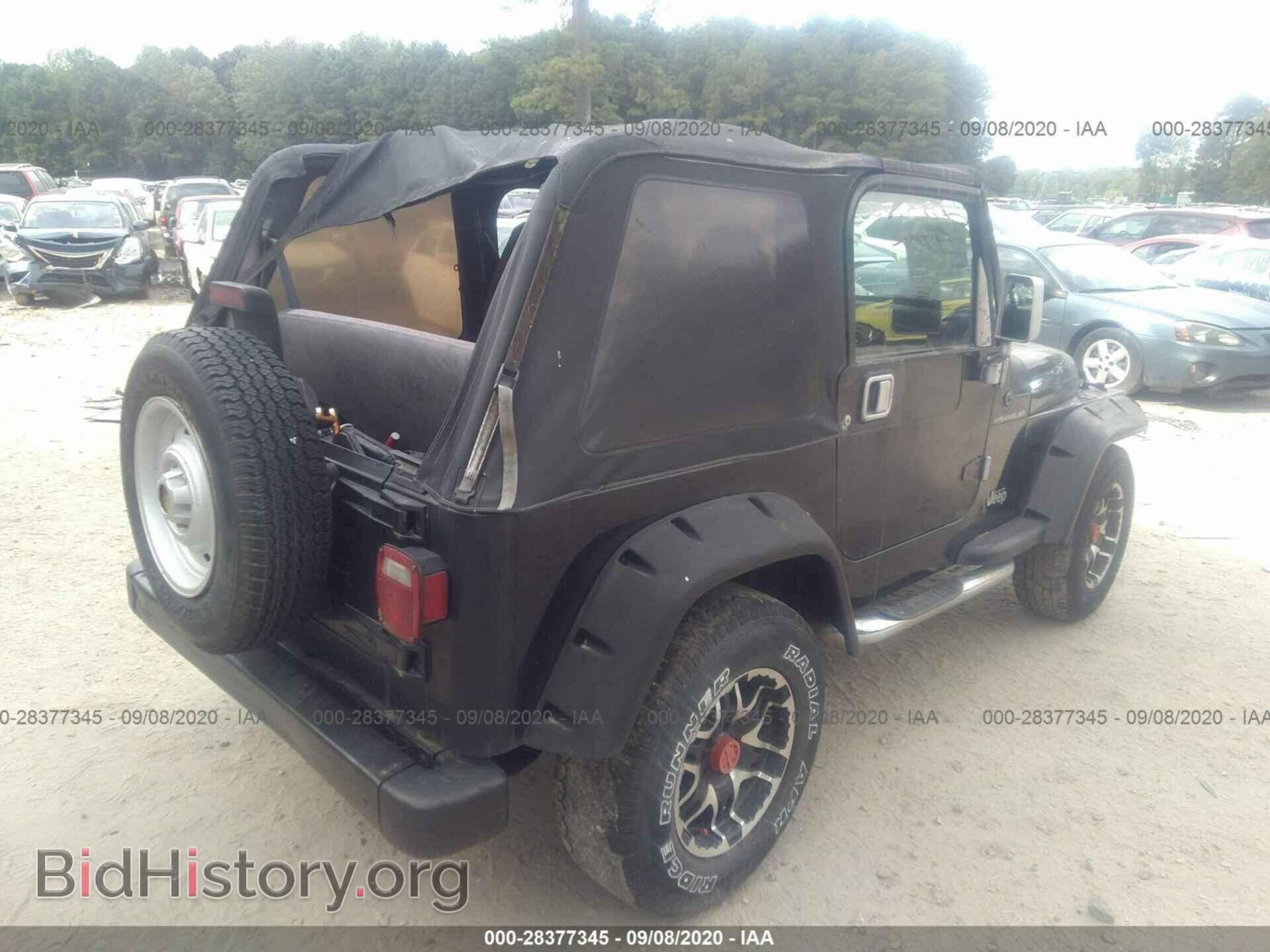 2000 JEEP WRANGLER - VIN: 1J4FA29P0YP787564 - Фото 4