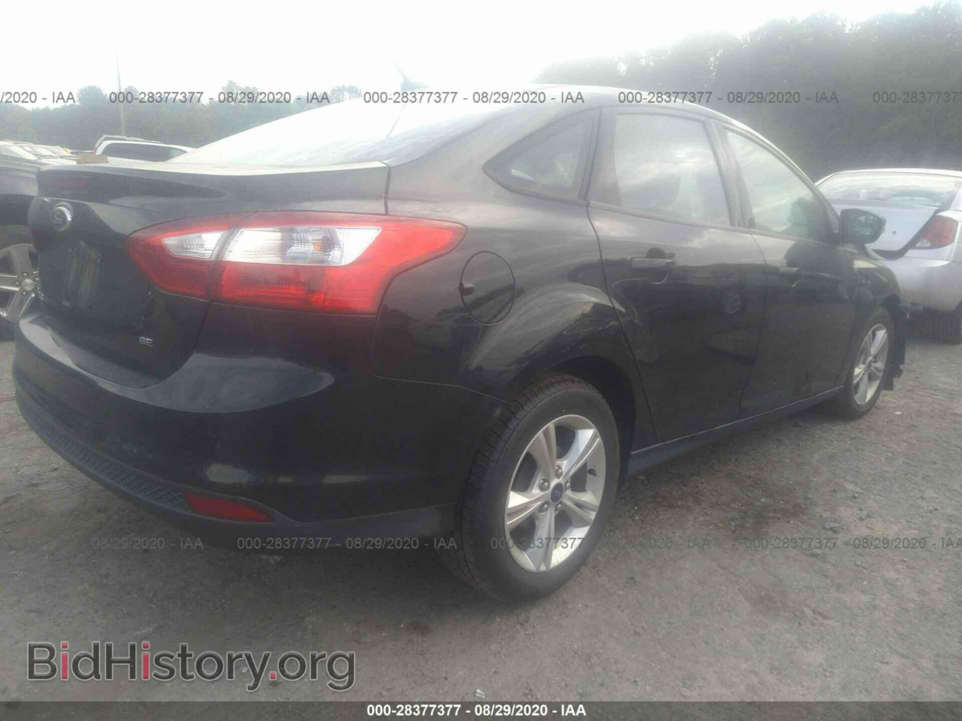 2014 FORD FOCUS - VIN: 1FADP3F29EL268127 - Photo 4