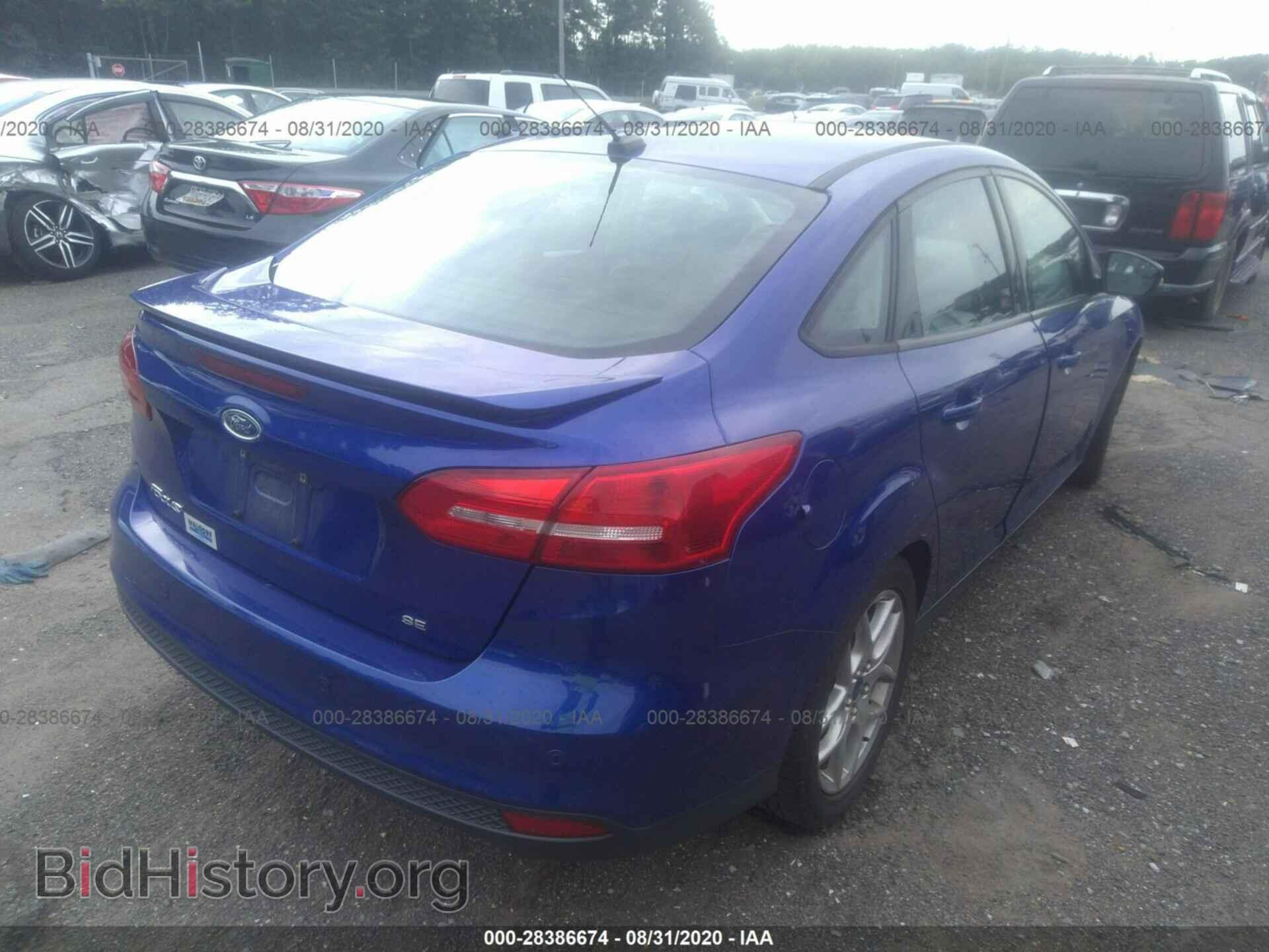 2015 FORD FOCUS - VIN: 1FADP3F22FL286373 - Photo 4