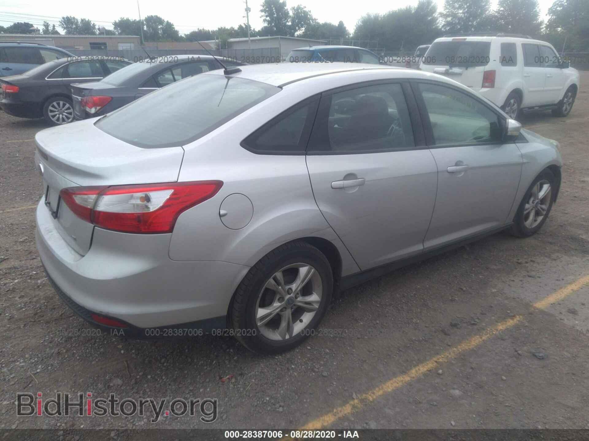 2013 FORD FOCUS - VIN: 1FADP3F22DL194631 - Photo 4
