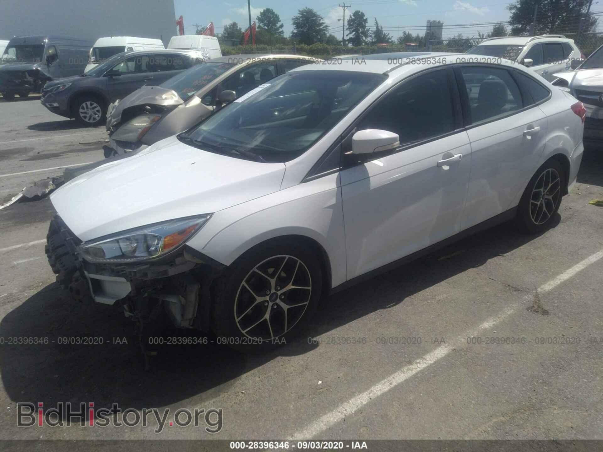 2015 FORD FOCUS - VIN: 1FADP3F22FL214296 - Photo 2