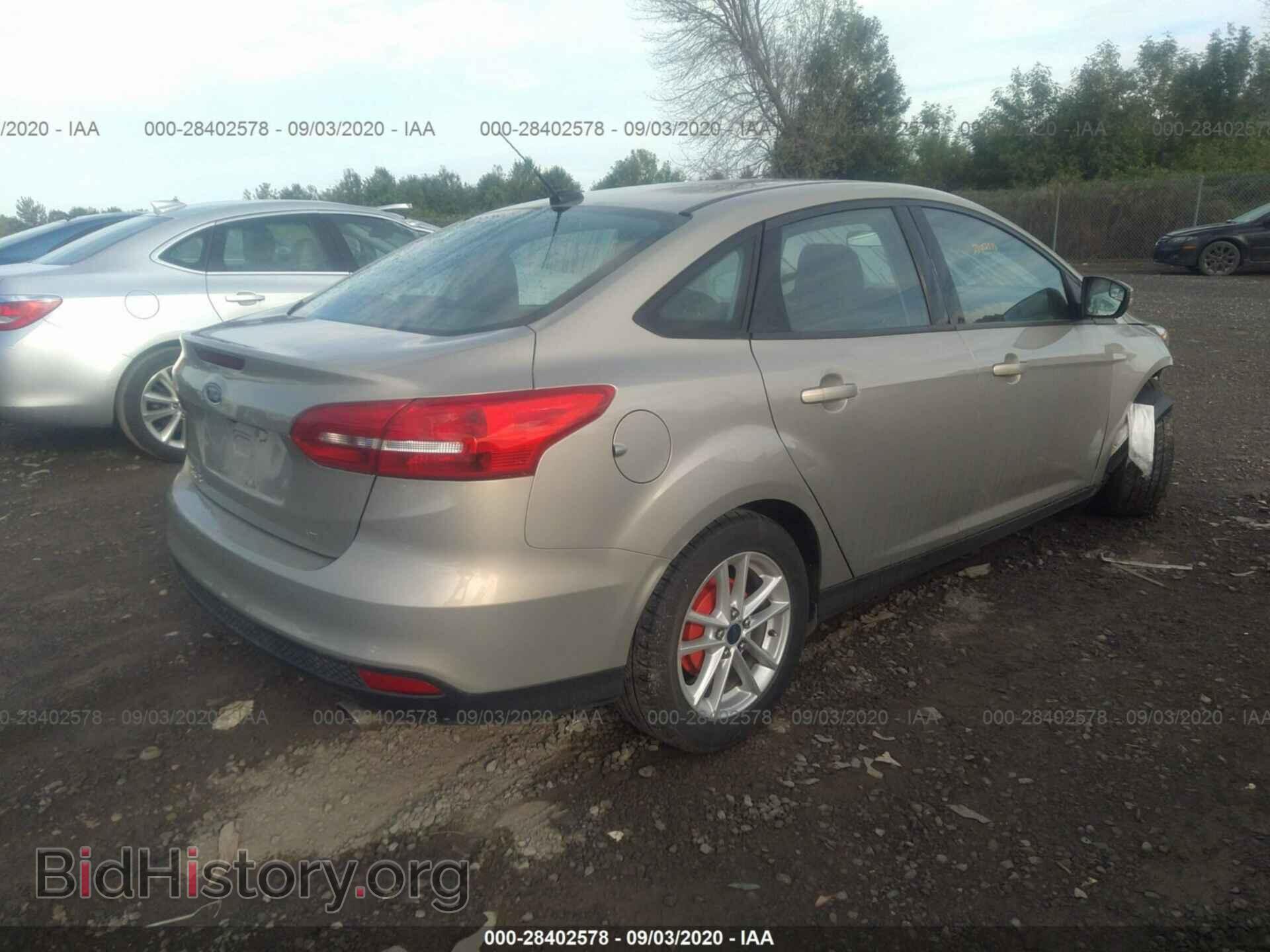 2015 FORD FOCUS - VIN: 1FADP3F20FL289322 - Photo 4