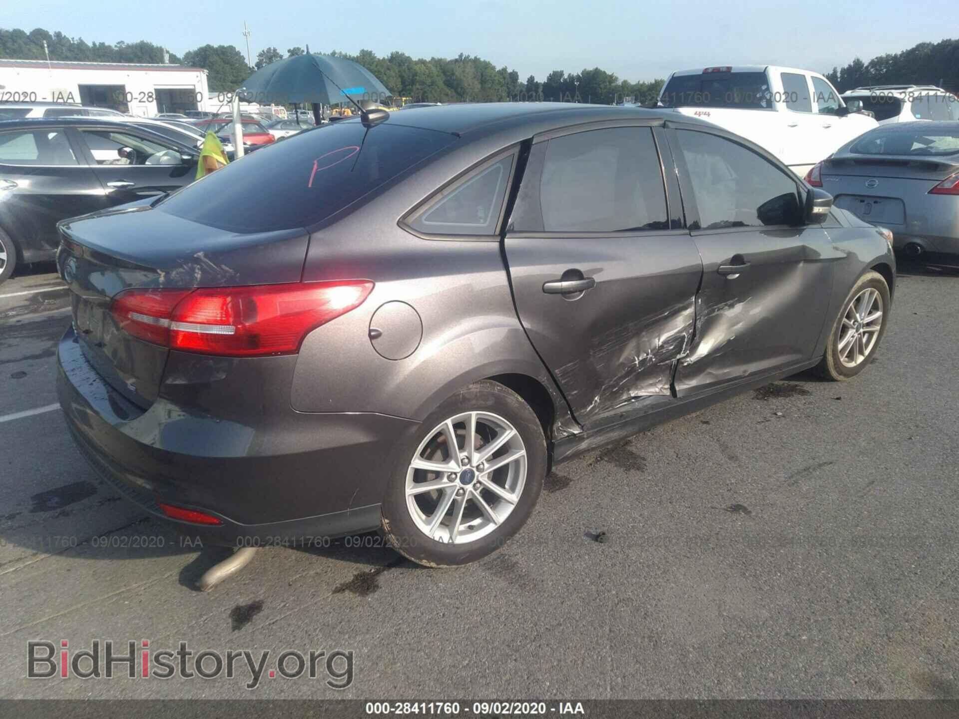2015 FORD FOCUS - VIN: 1FADP3F20FL243117 - Photo 4