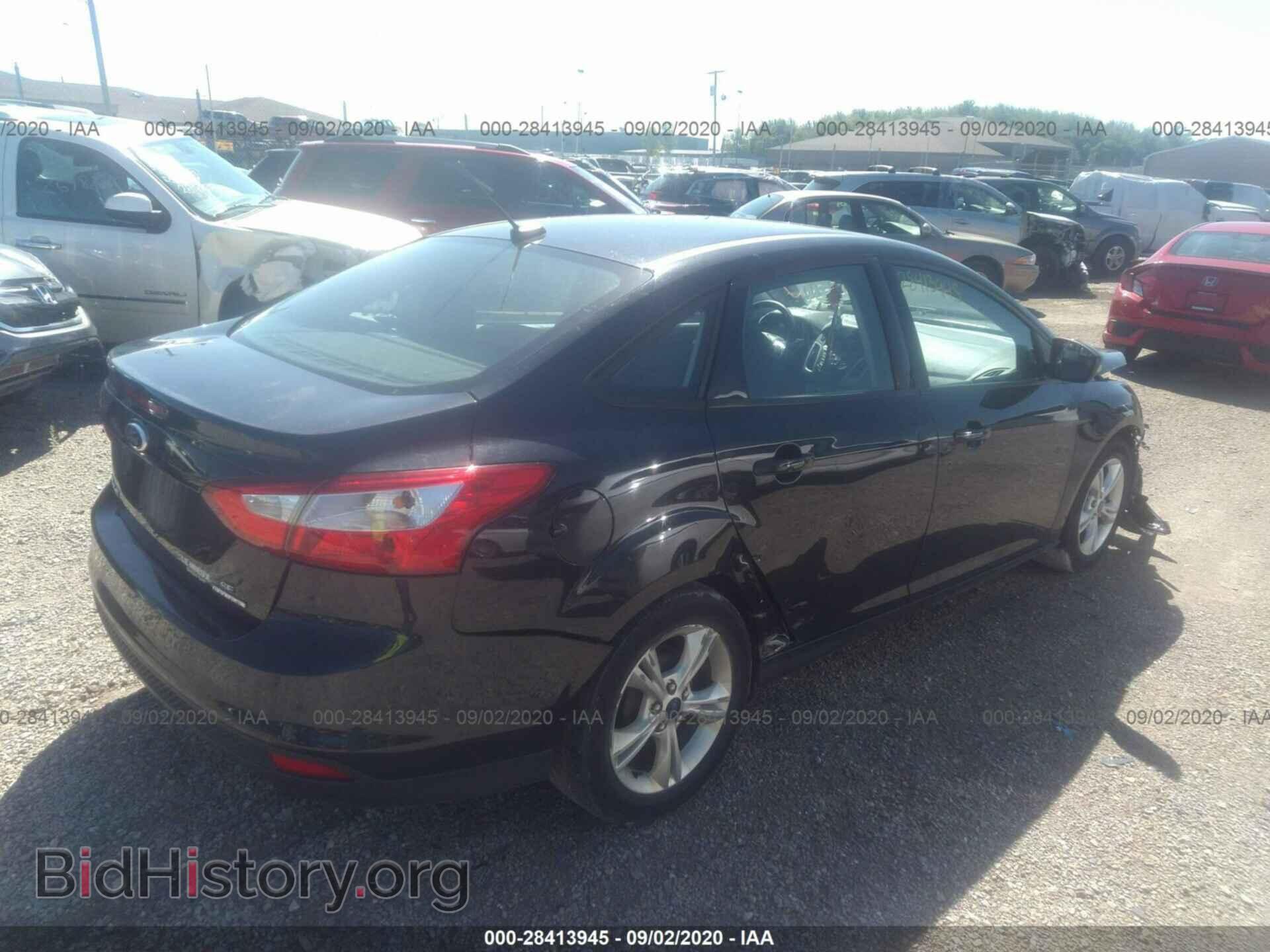 2014 FORD FOCUS - VIN: 1FADP3F21EL458875 - Photo 4
