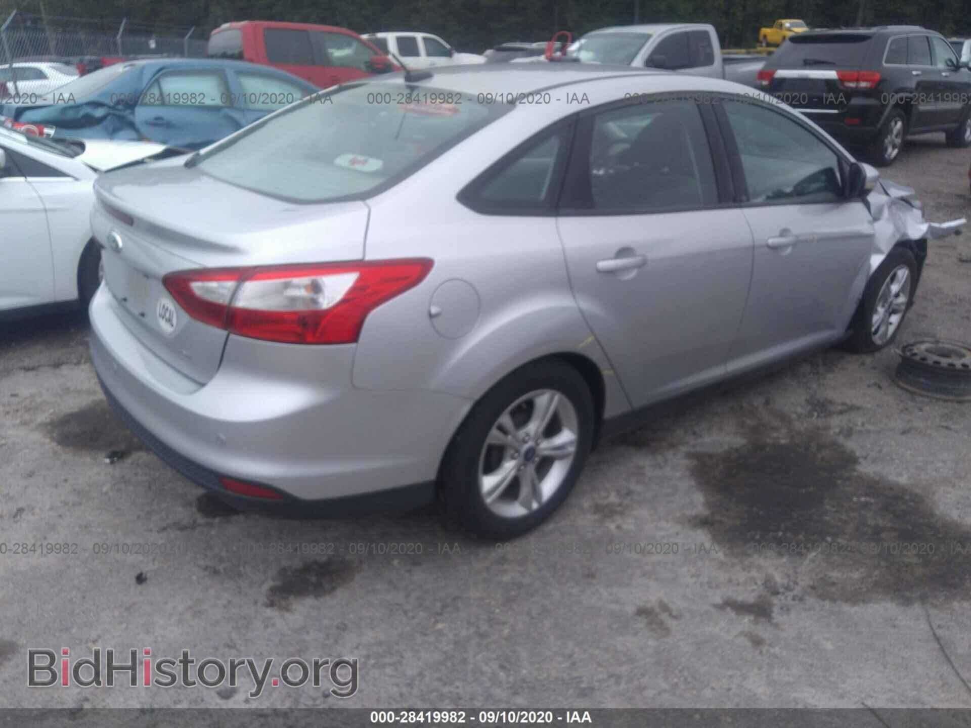 2014 FORD FOCUS - VIN: 1FADP3F25EL166372 - Photo 4