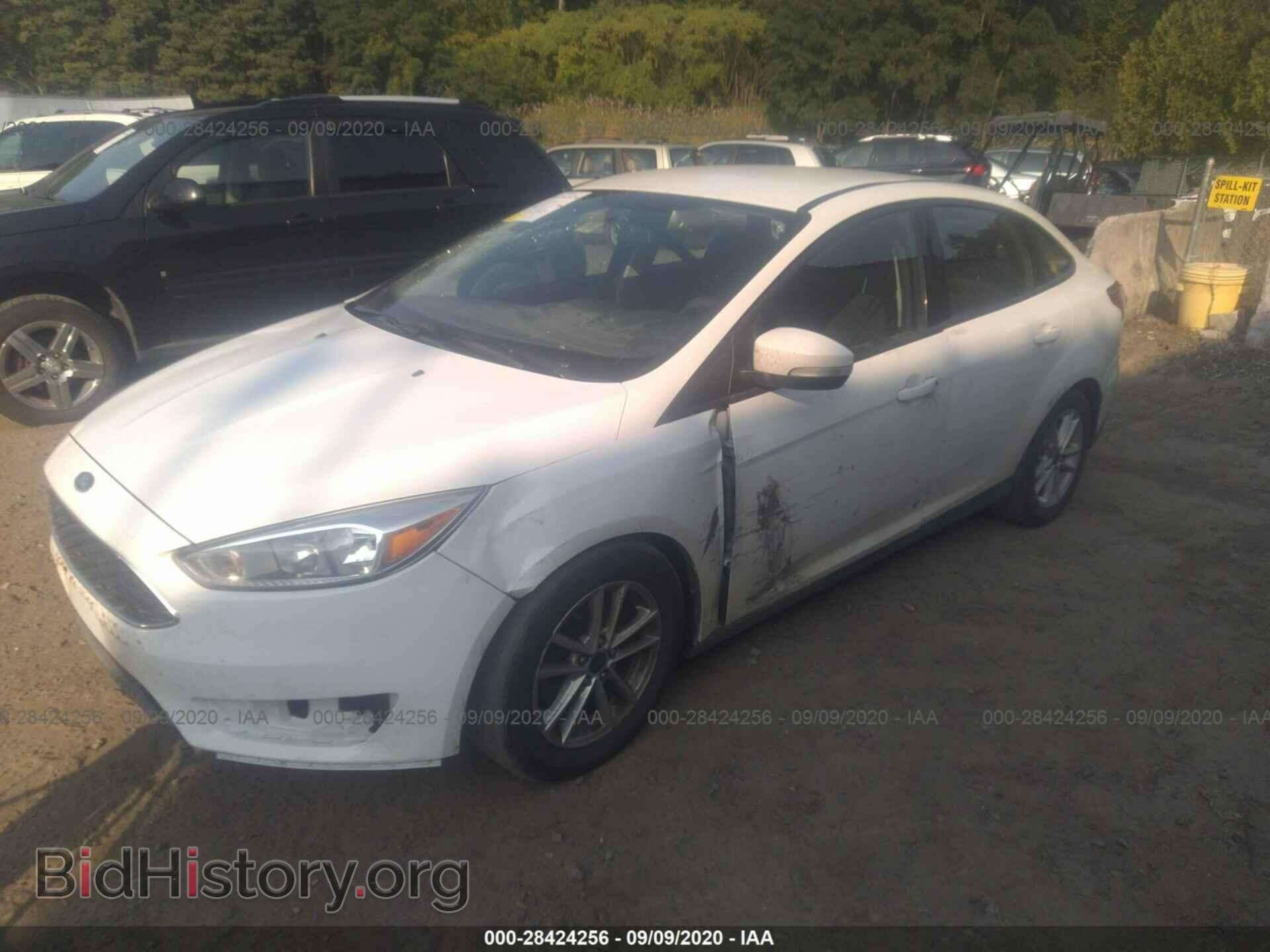 2016 FORD FOCUS - VIN: 1FADP3F25GL317875 - Фото 2