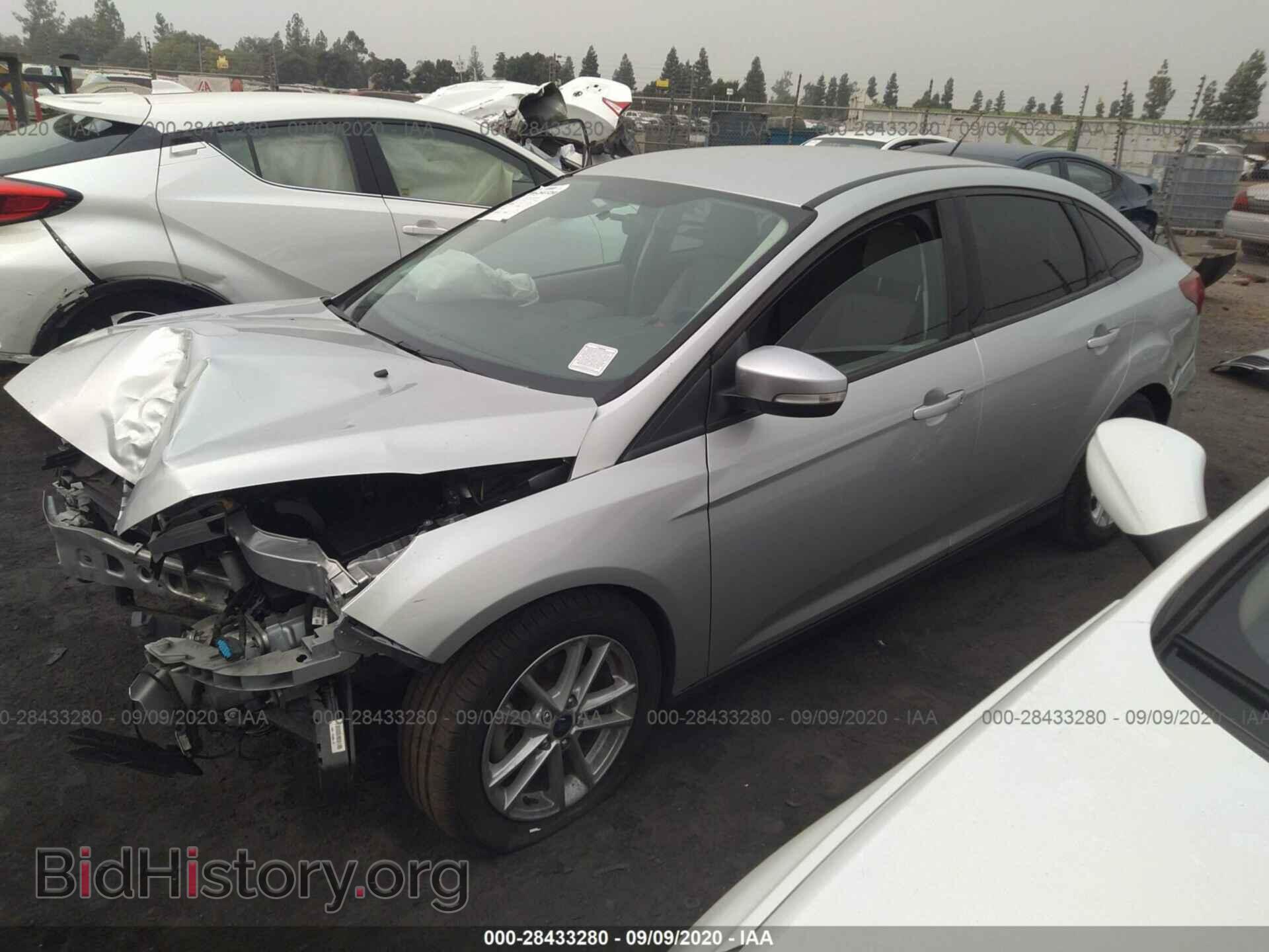 2016 FORD FOCUS - VIN: 1FADP3F21GL352655 - Photo 2
