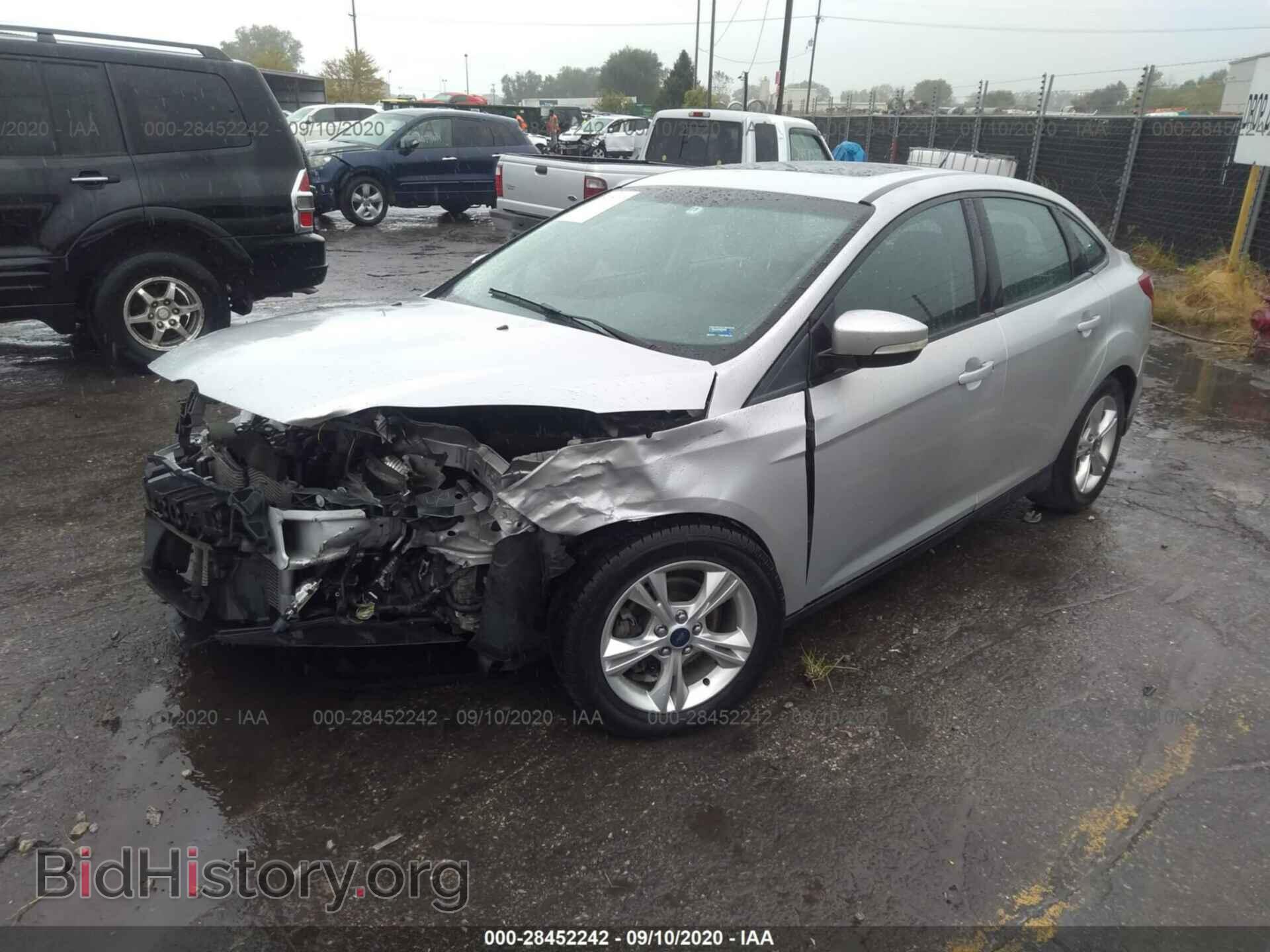 2014 FORD FOCUS - VIN: 1FADP3F2XEL312569 - Photo 2