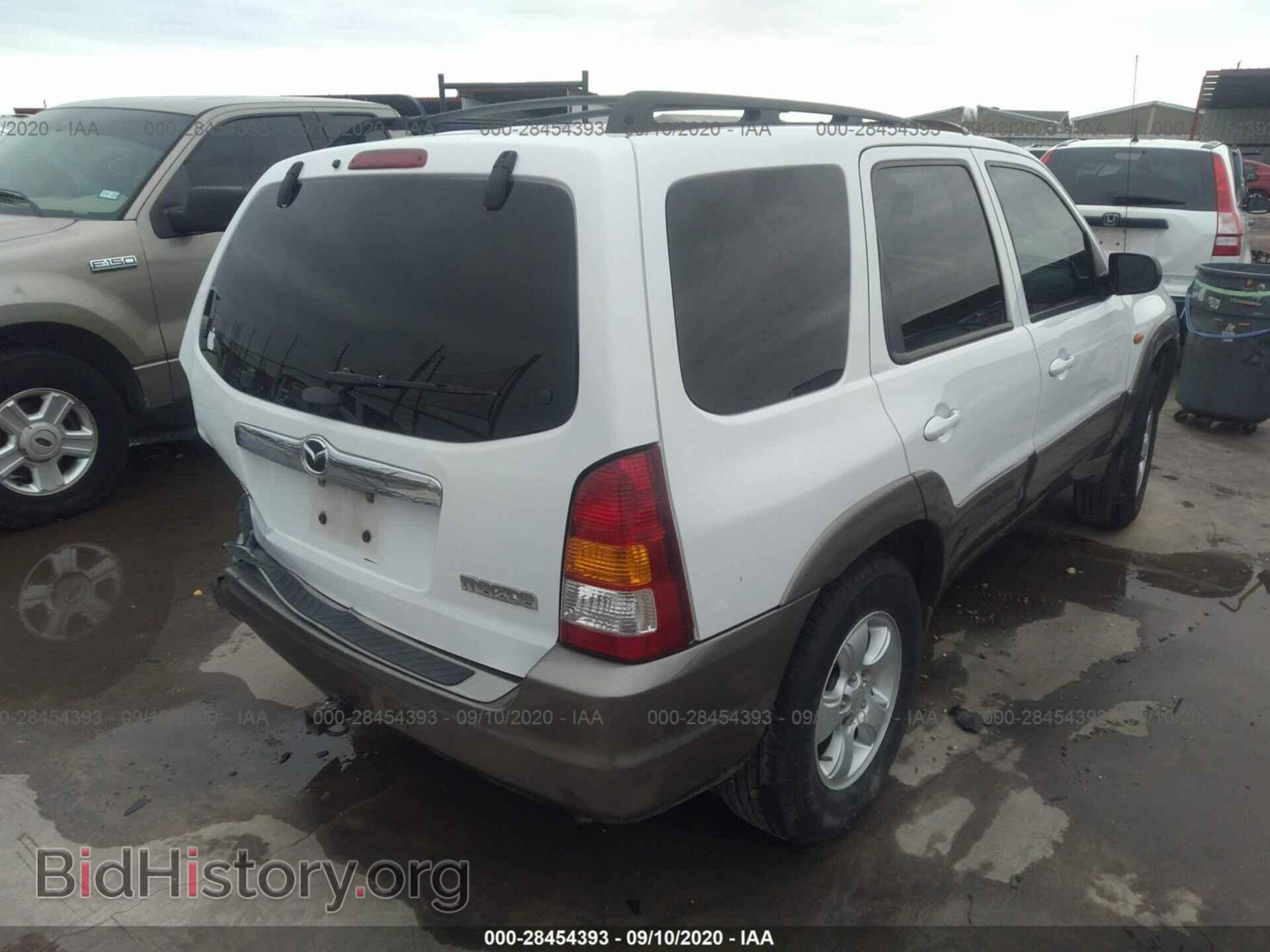 2004 MAZDA TRIBUTE - VIN: 4F2CZ06144KM12421 - Photo 4
