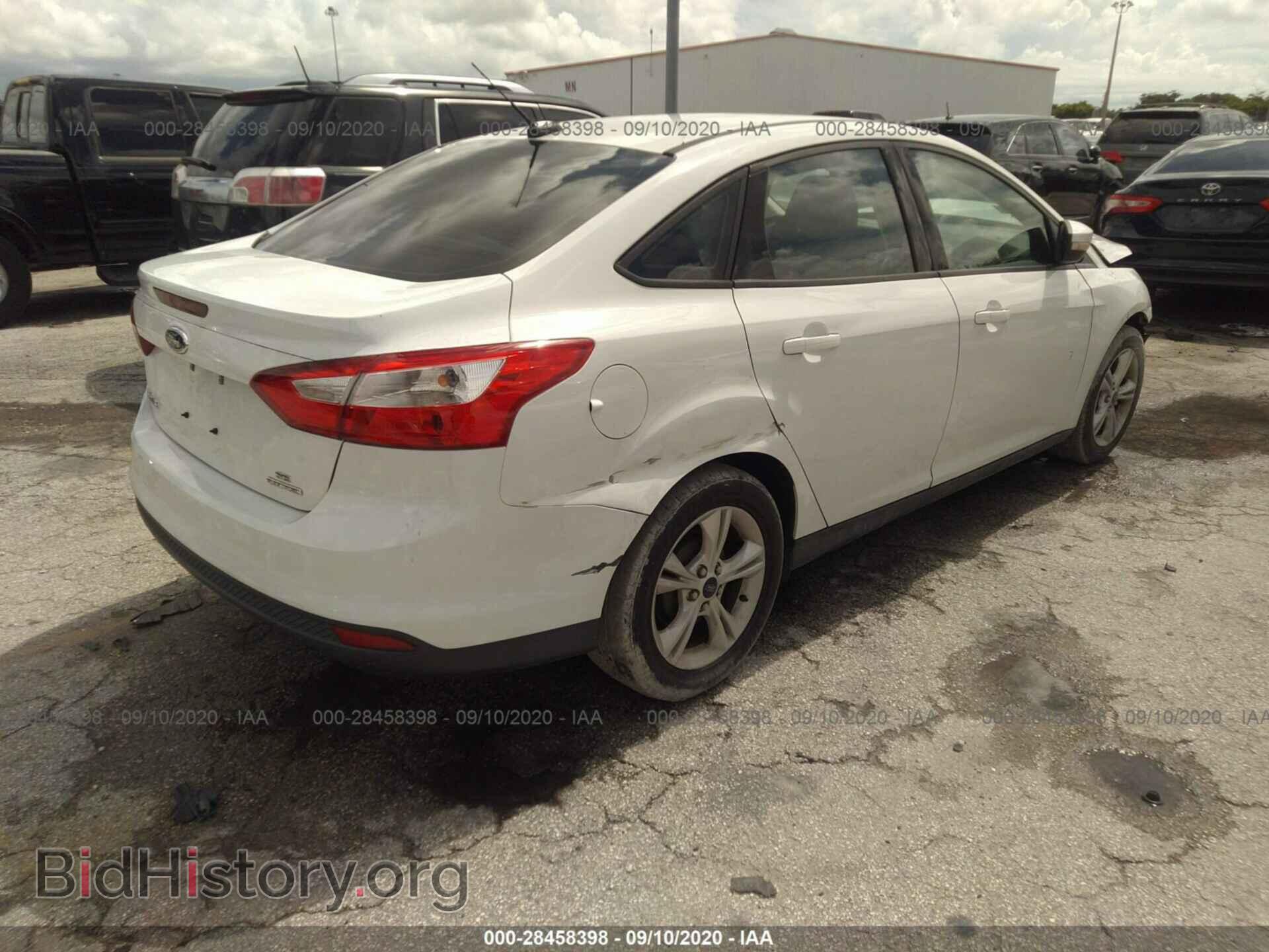 2014 FORD FOCUS - VIN: 1FADP3F20EL436558 - Photo 4