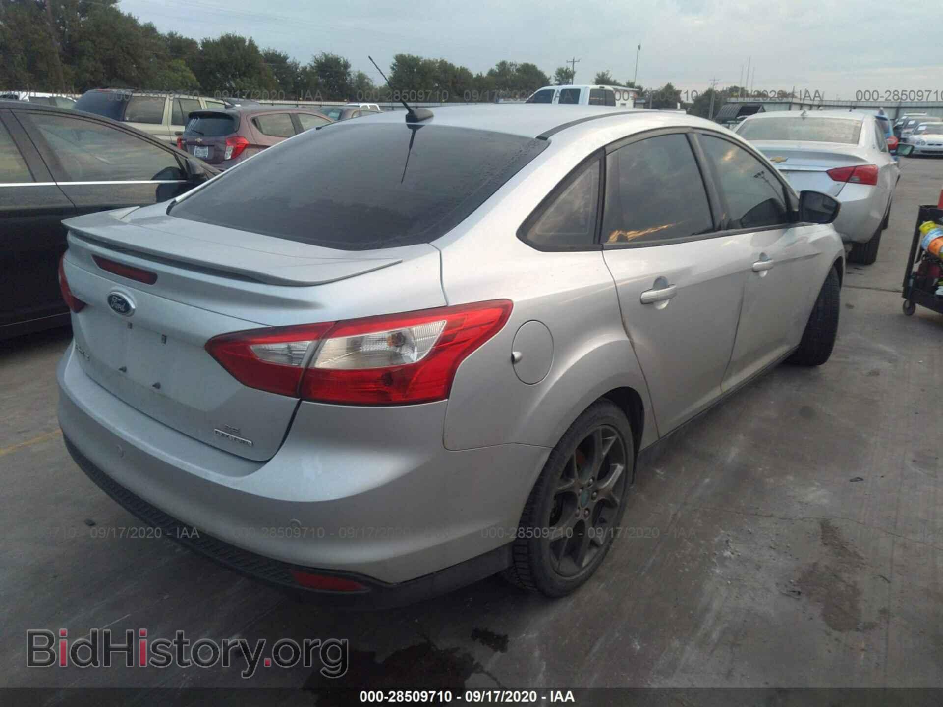 2014 FORD FOCUS - VIN: 1FADP3F21EL137872 - Photo 4