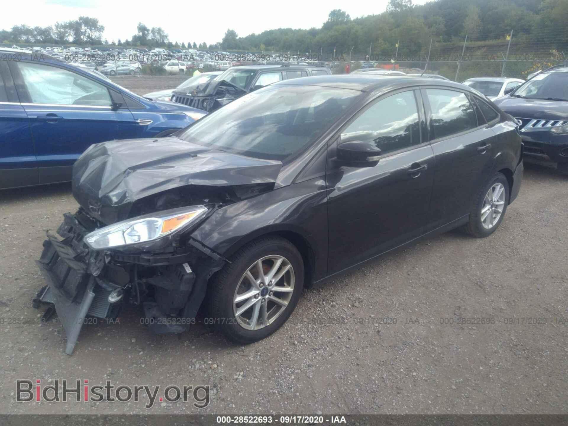2015 FORD FOCUS - VIN: 1FADP3F22FL348497 - Photo 2