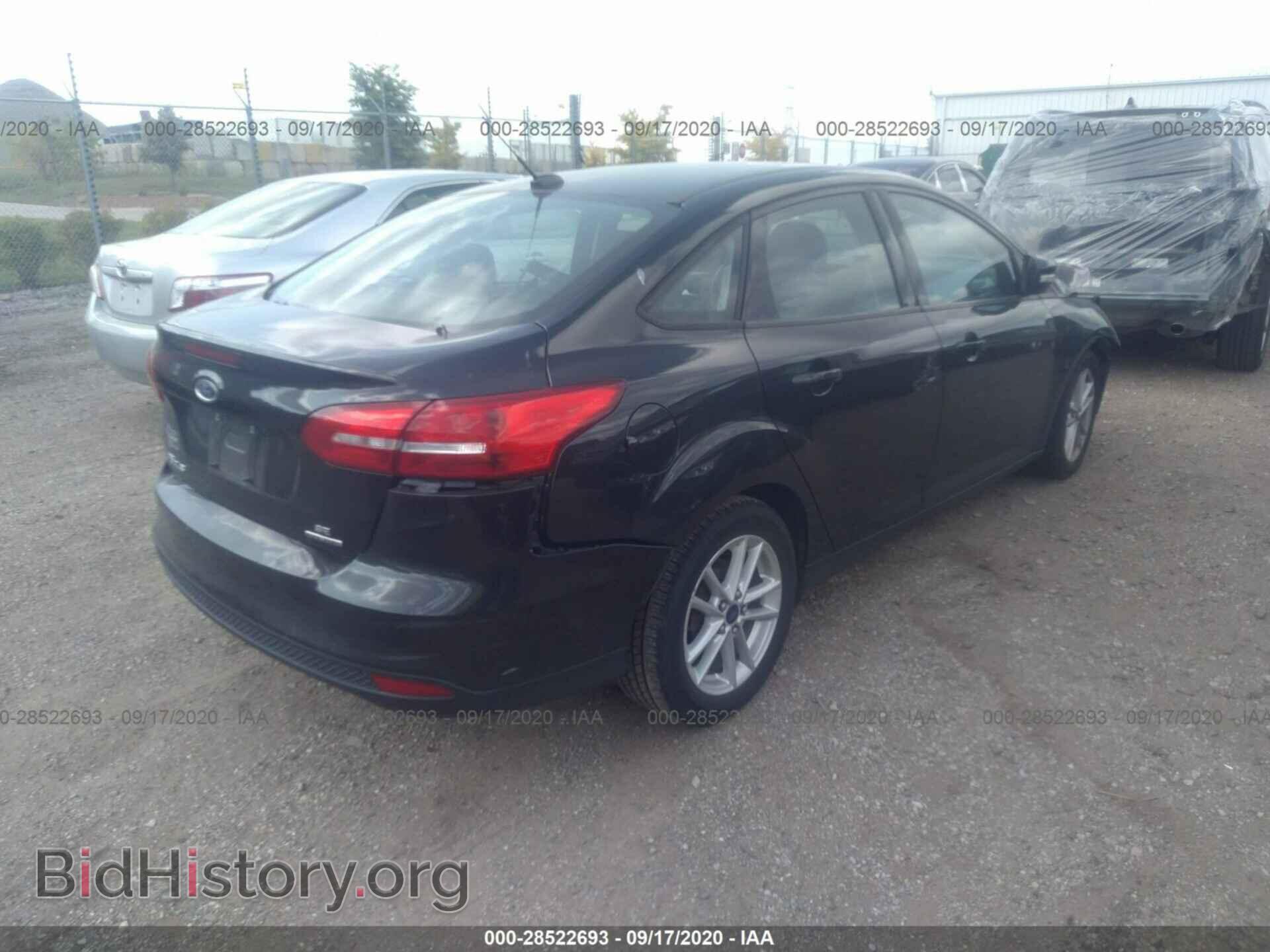 2015 FORD FOCUS - VIN: 1FADP3F22FL348497 - Photo 4
