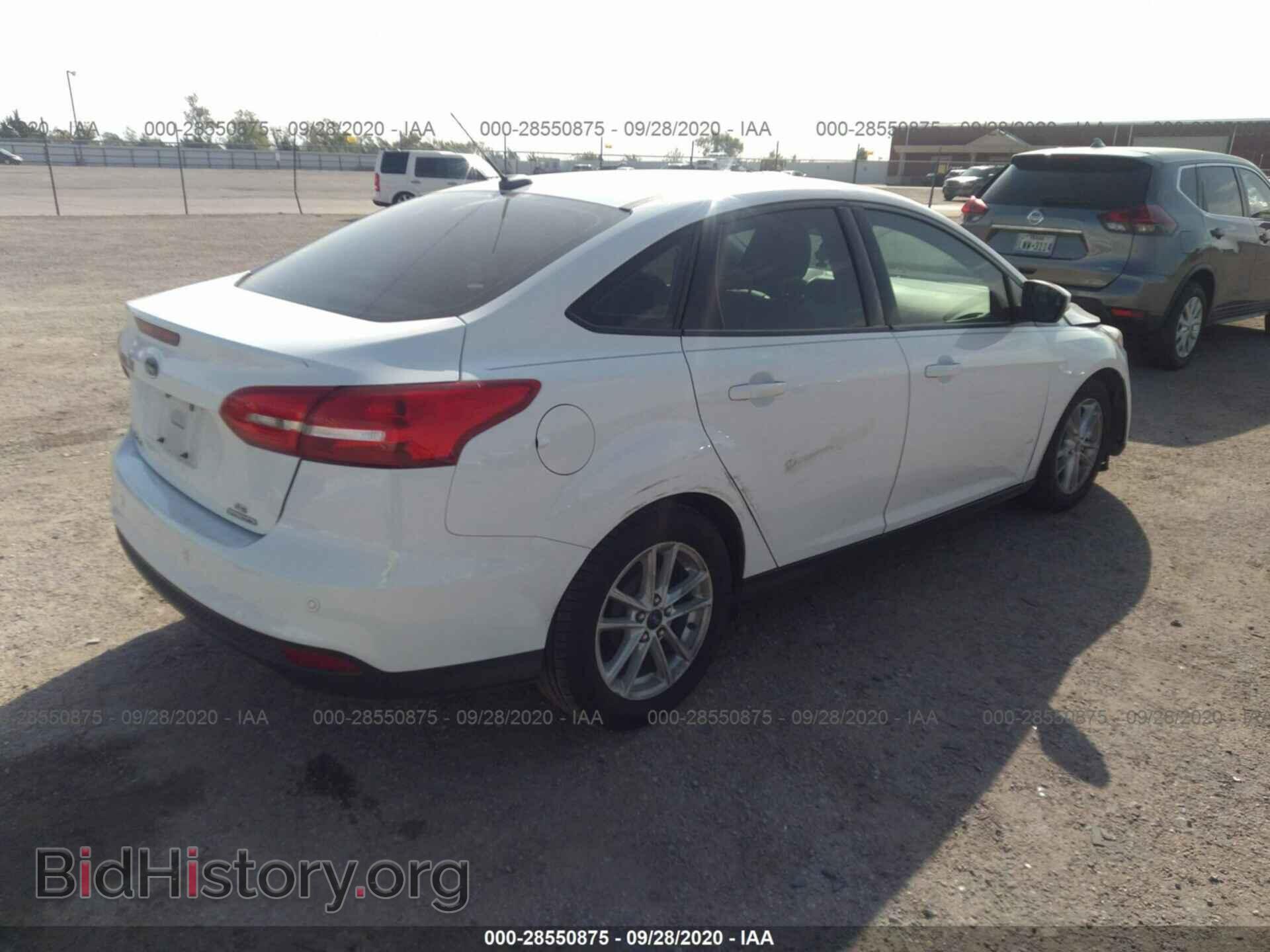 2015 FORD FOCUS - VIN: 1FADP3F21FL219621 - Photo 4