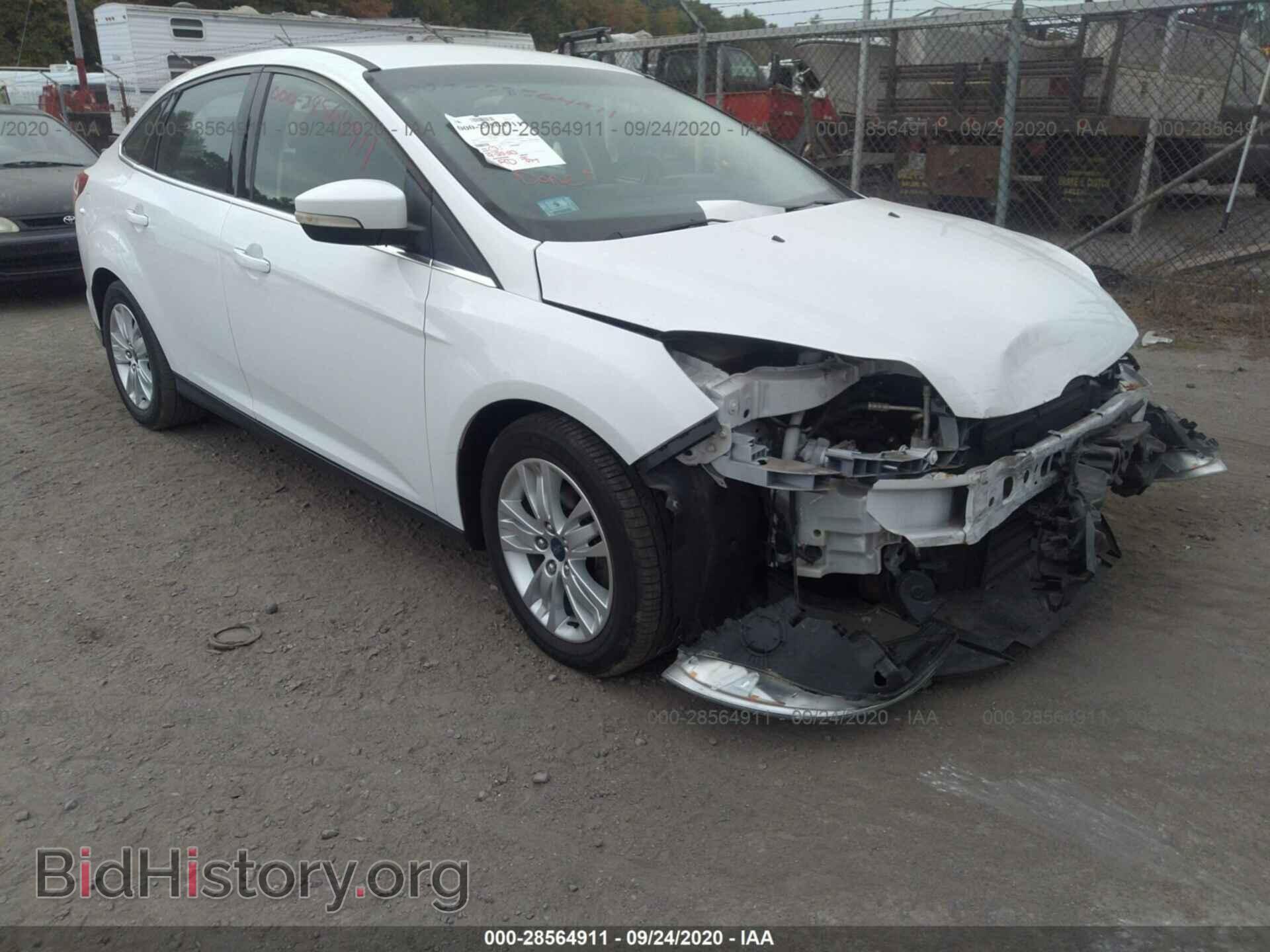 Фотография 1FAHP3H24CL412453 - FORD FOCUS 2012