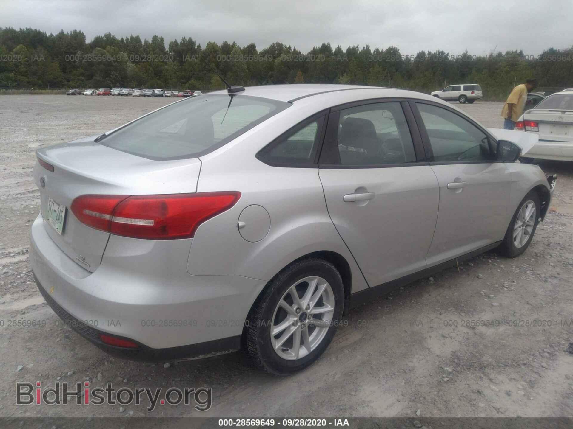 2016 FORD FOCUS - VIN: 1FADP3F21GL303097 - Photo 4