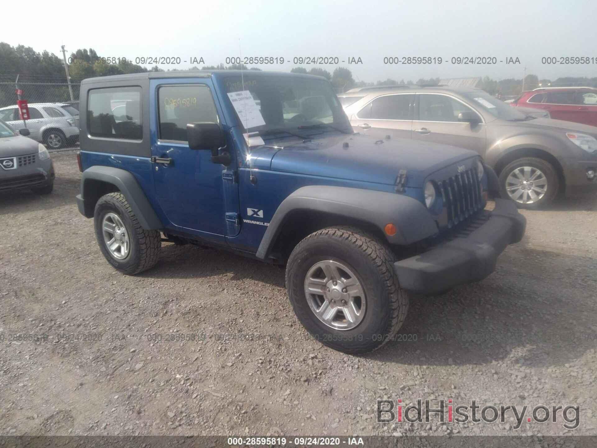 Photo 1J4FA24119L713100 - JEEP WRANGLER 2009