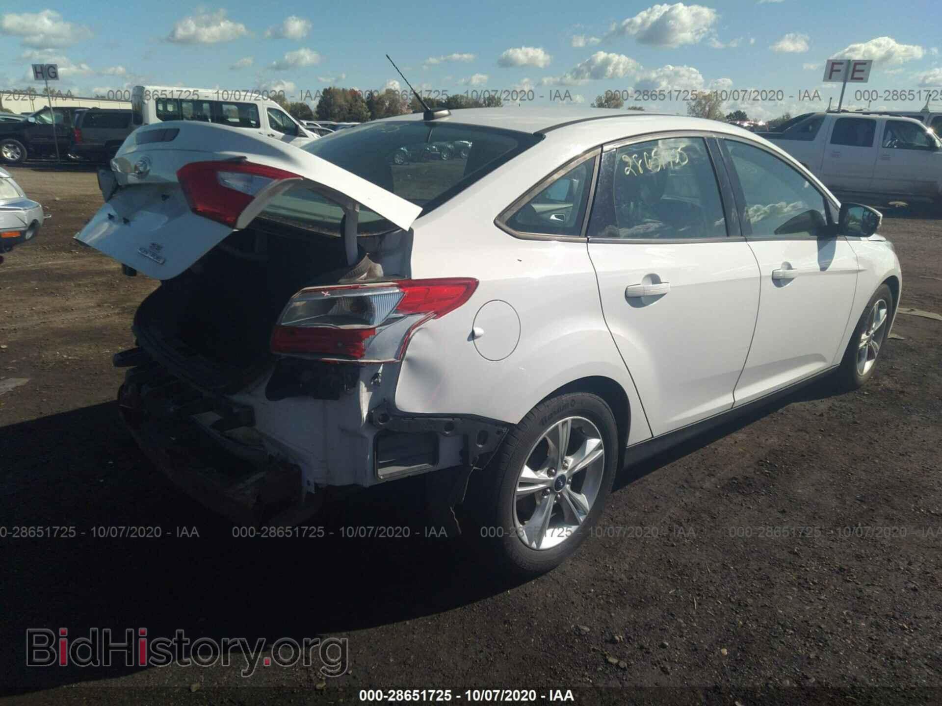 2014 FORD FOCUS - VIN: 1FADP3F21EL160889 - Photo 4
