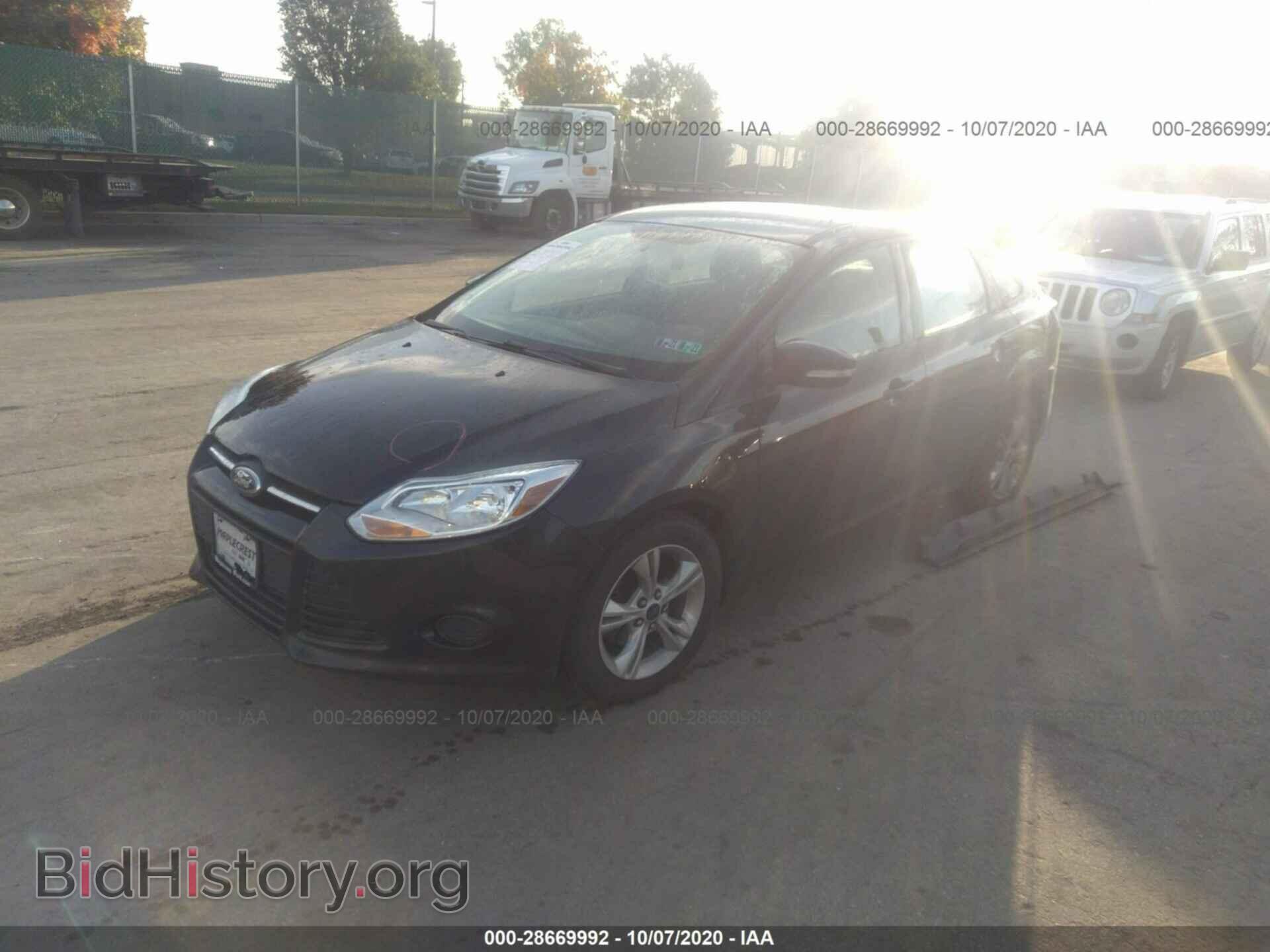 2014 FORD FOCUS - VIN: 1FADP3F2XEL424885 - Photo 2