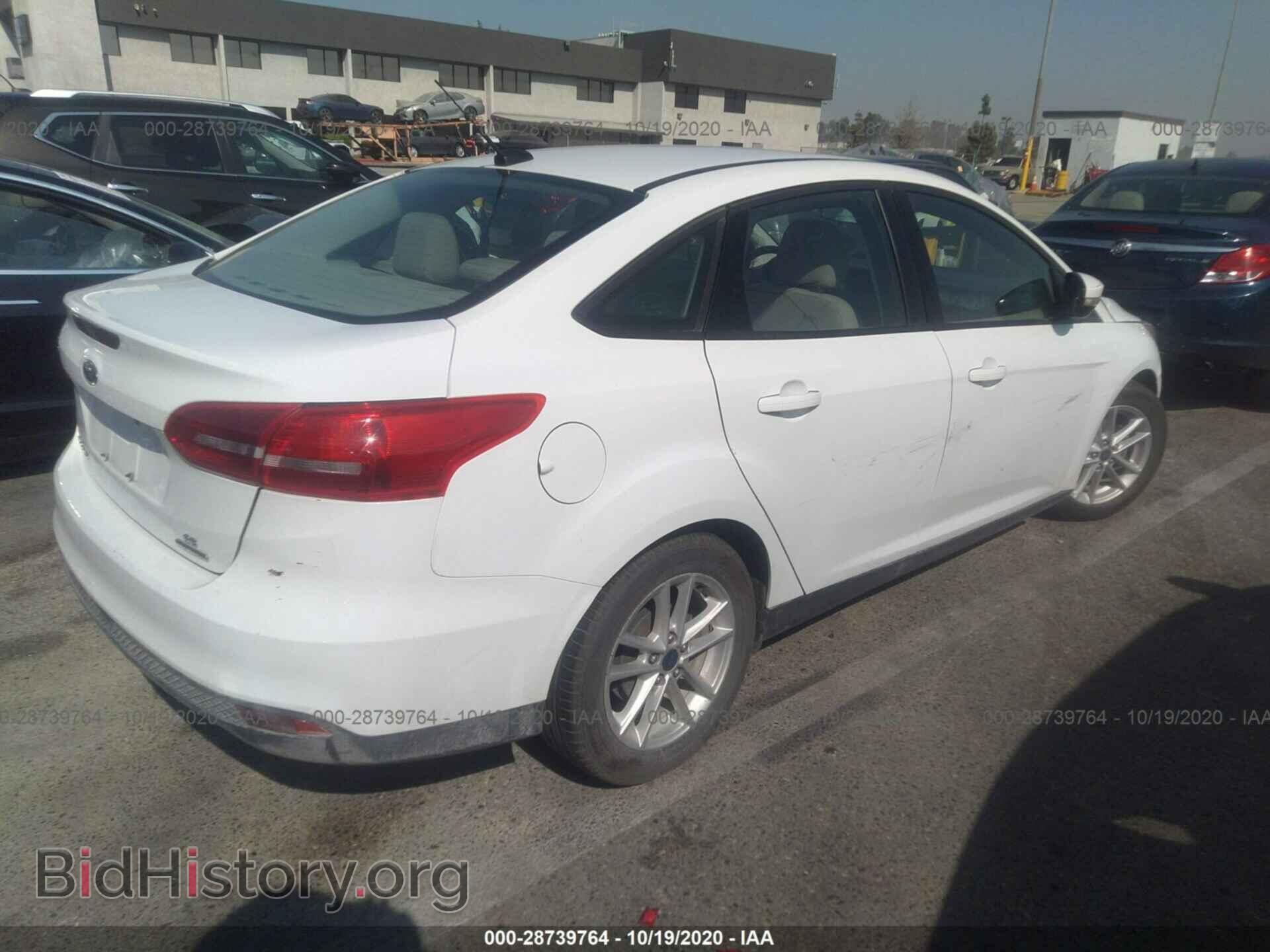2016 FORD FOCUS - VIN: 1FADP3F22GL402169 - Photo 4