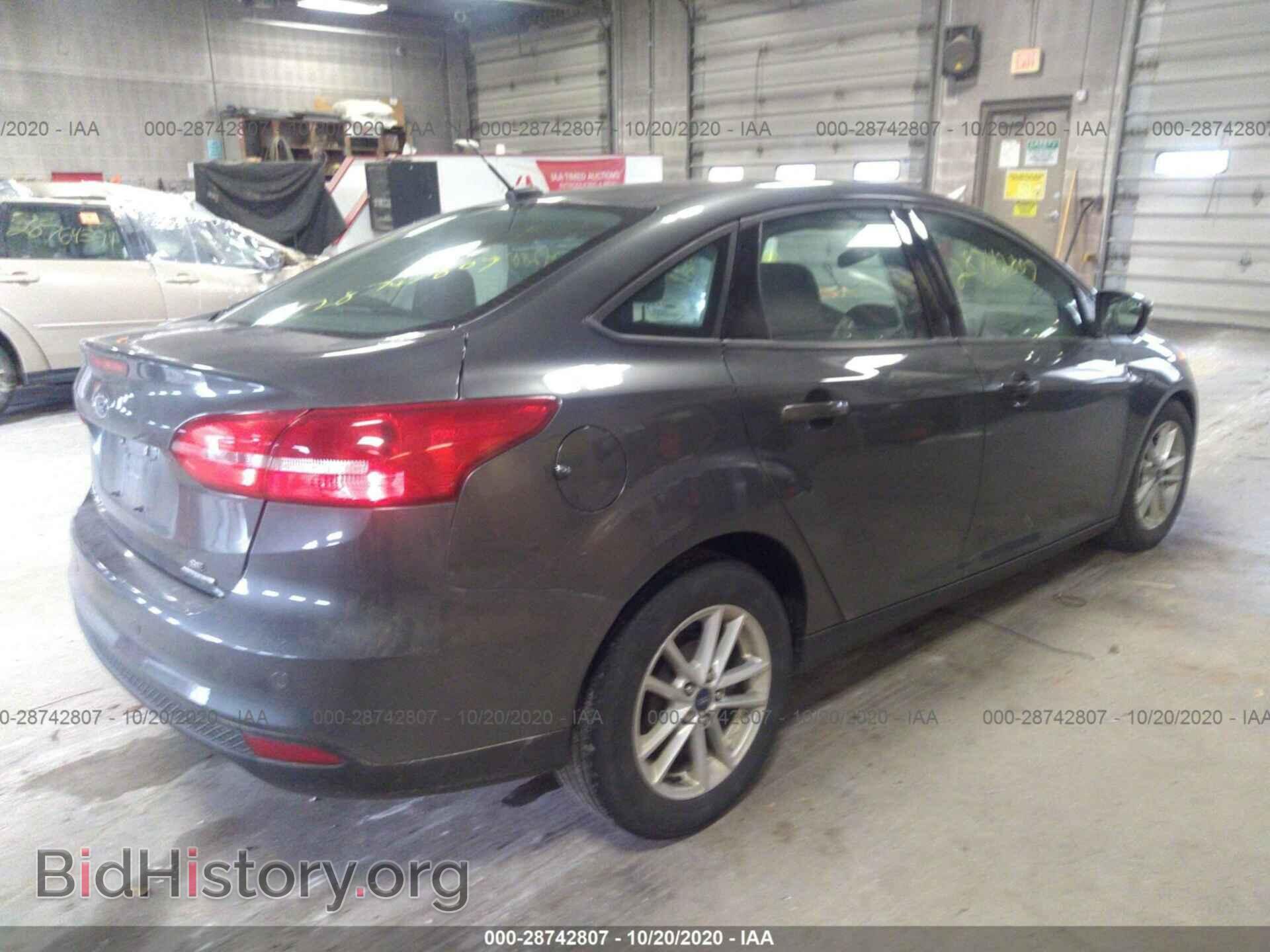 2016 FORD FOCUS - VIN: 1FADP3F21GL386224 - Photo 4