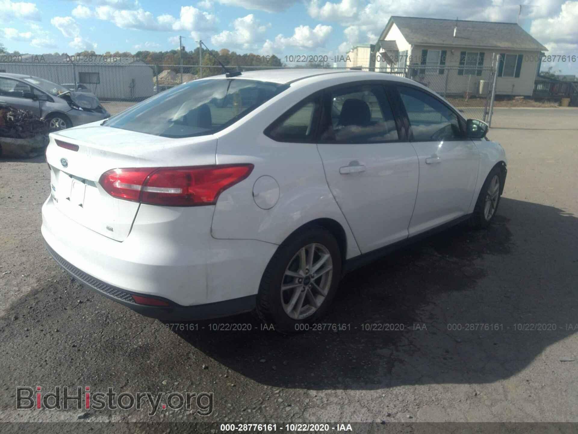 2015 FORD FOCUS - VIN: 1FADP3F29FL216143 - Photo 4
