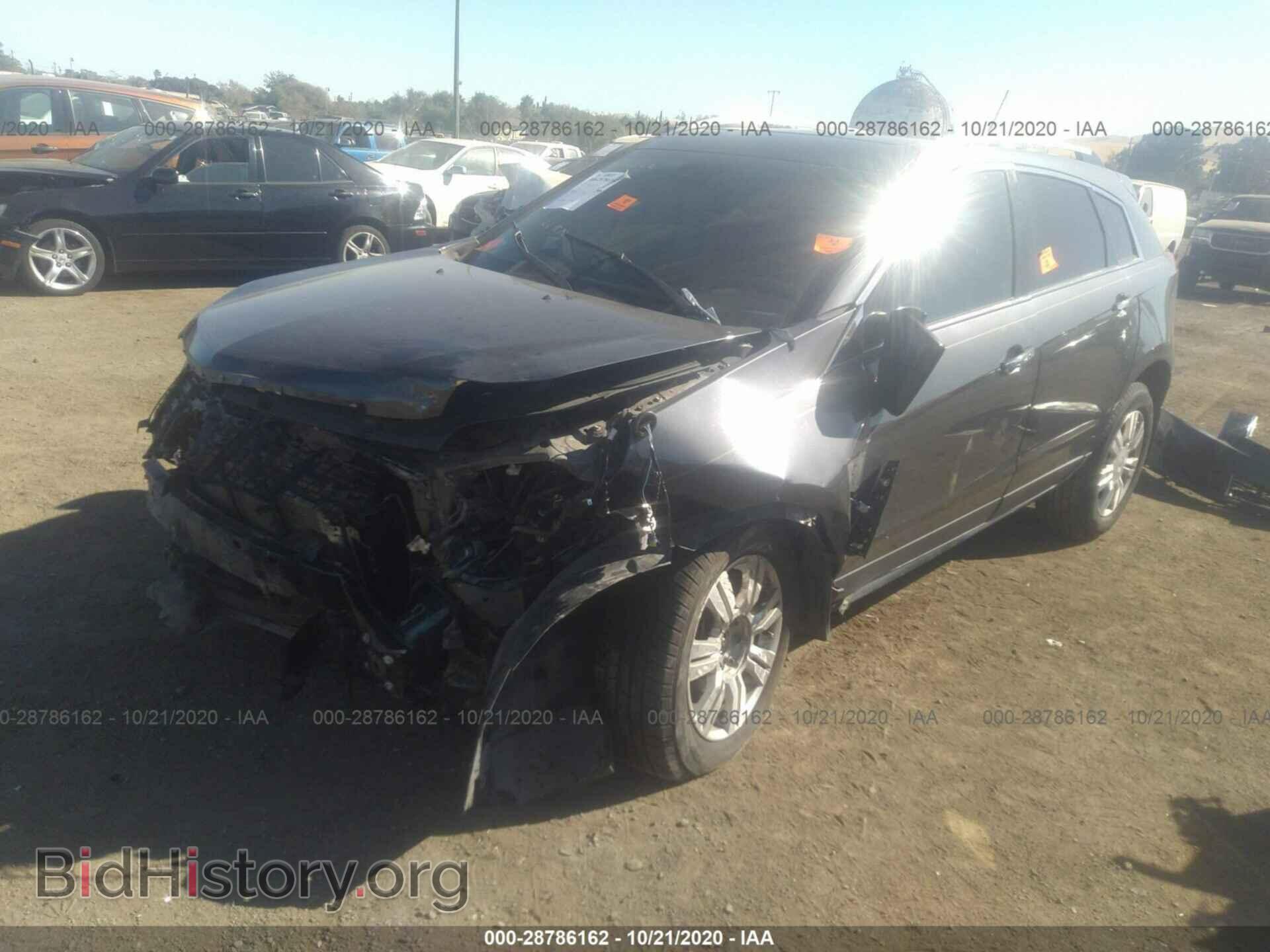 2013 CADILLAC SRX - VIN: 3GYFNCE37DS577357 - Фото 2
