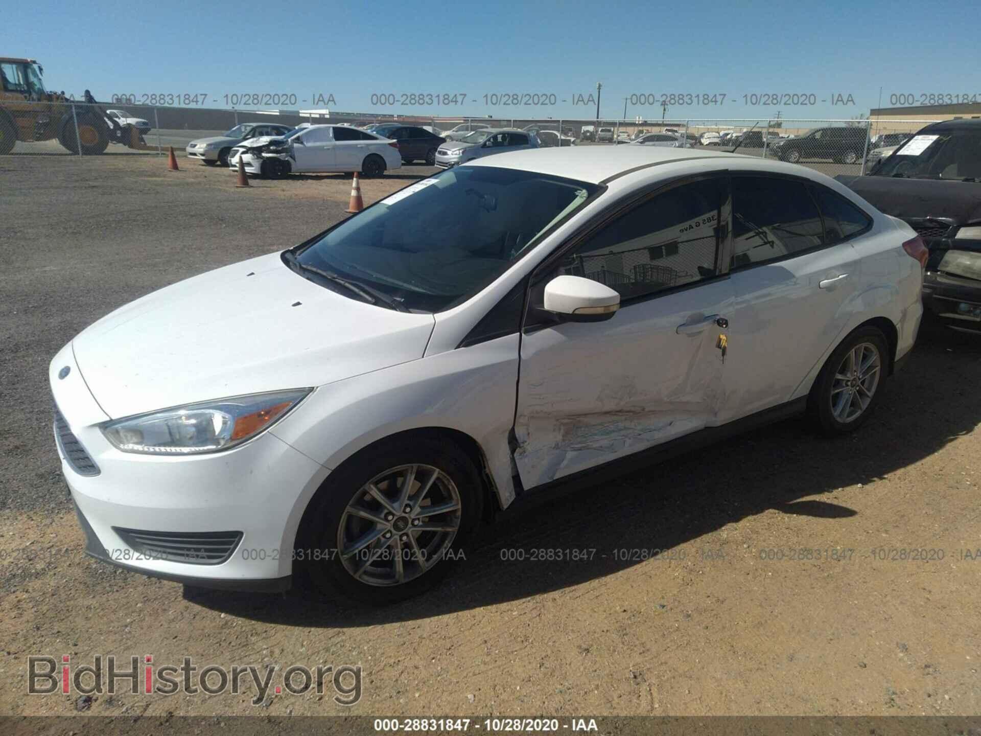 2016 FORD FOCUS - VIN: 1FADP3F27GL205871 - Photo 2