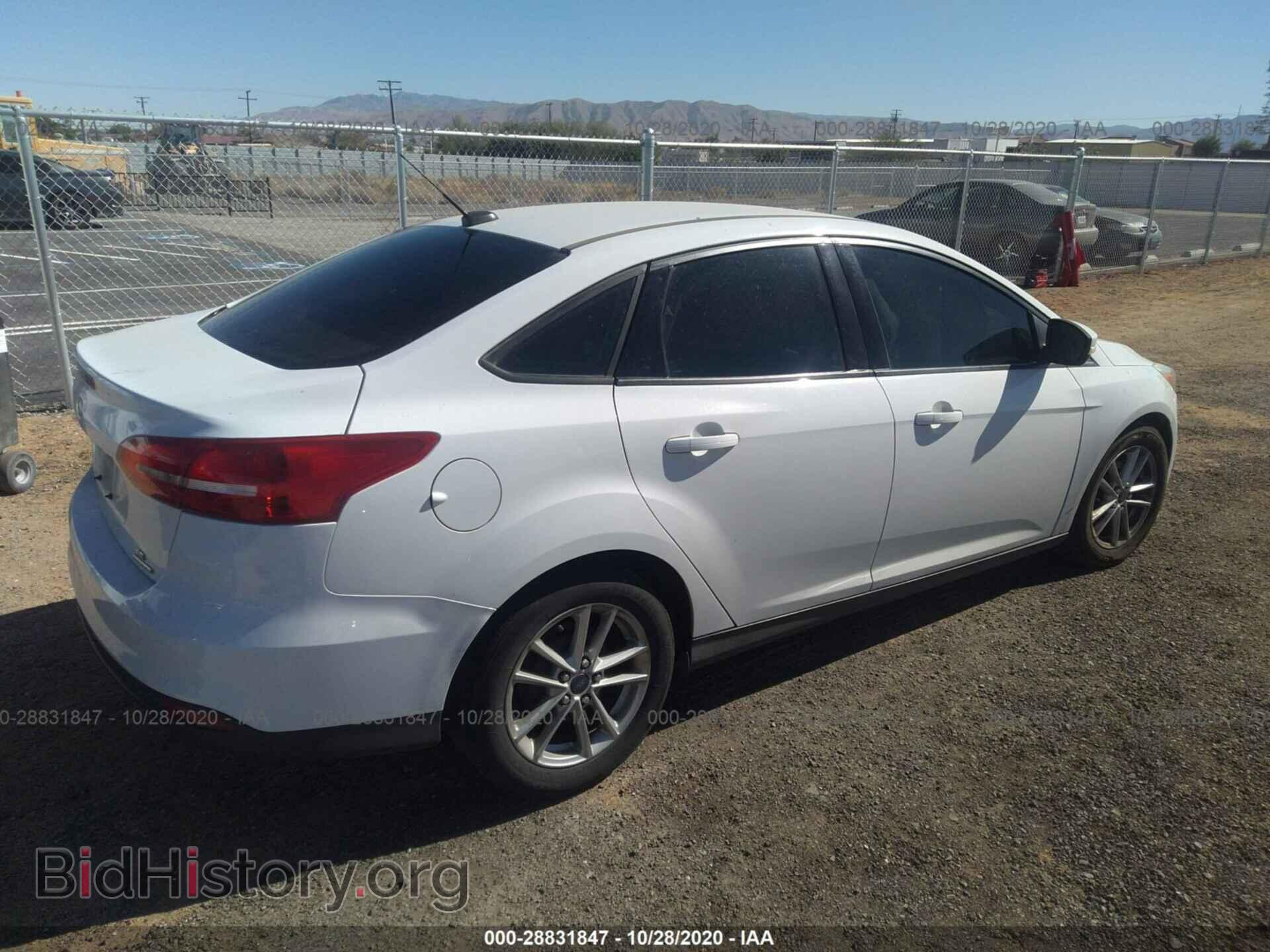 2016 FORD FOCUS - VIN: 1FADP3F27GL205871 - Photo 4