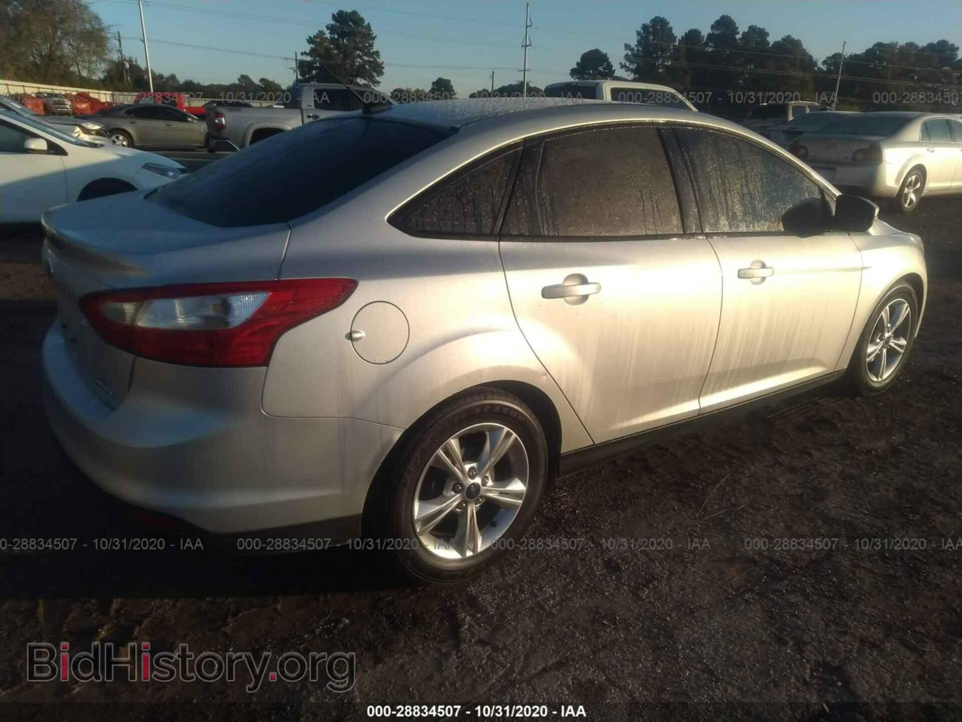 2014 FORD FOCUS - VIN: 1FADP3F20EL157708 - Photo 4