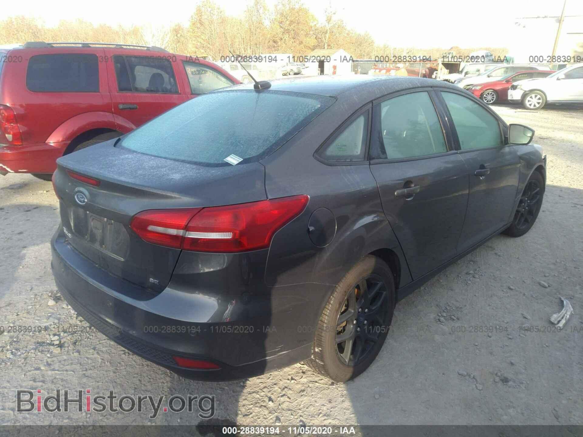 2016 FORD FOCUS - VIN: 1FADP3F21GL357032 - Photo 4