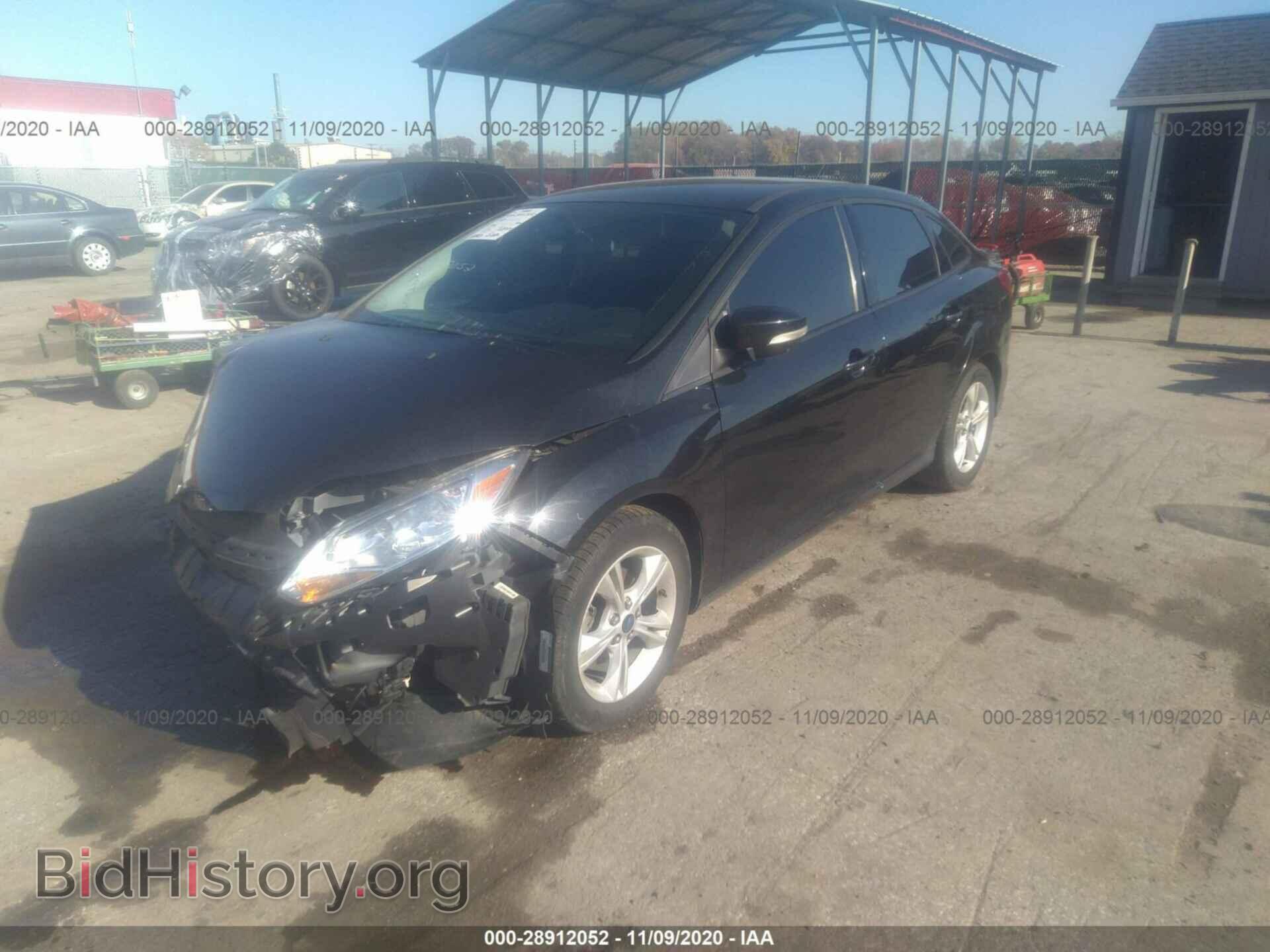 2014 FORD FOCUS - VIN: 1FADP3F21EL458438 - Photo 2
