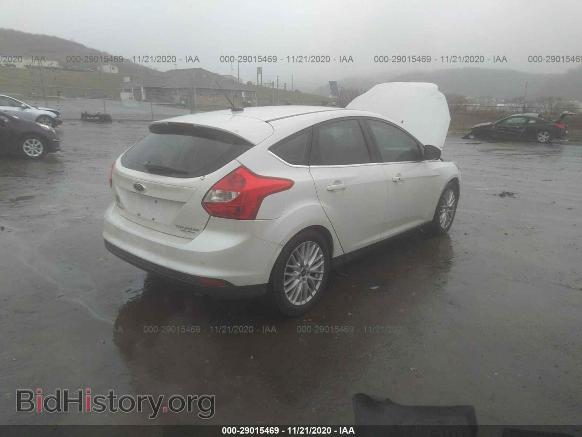 2014 FORD FOCUS - VIN: 1FADP3N21EL411928 - Photo 4