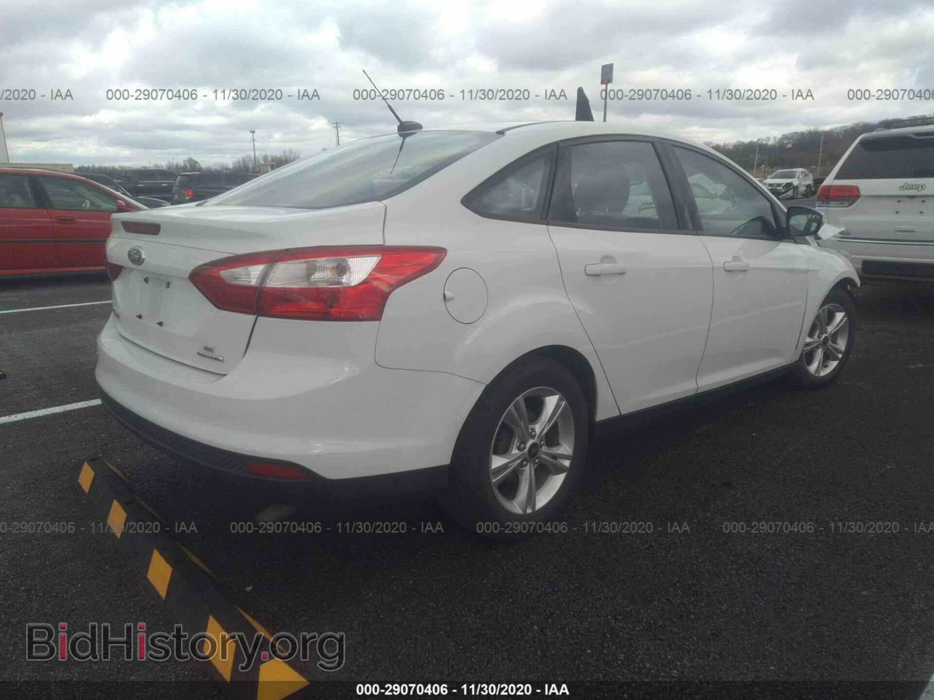 2014 FORD FOCUS - VIN: 1FADP3F29EL123329 - Photo 4