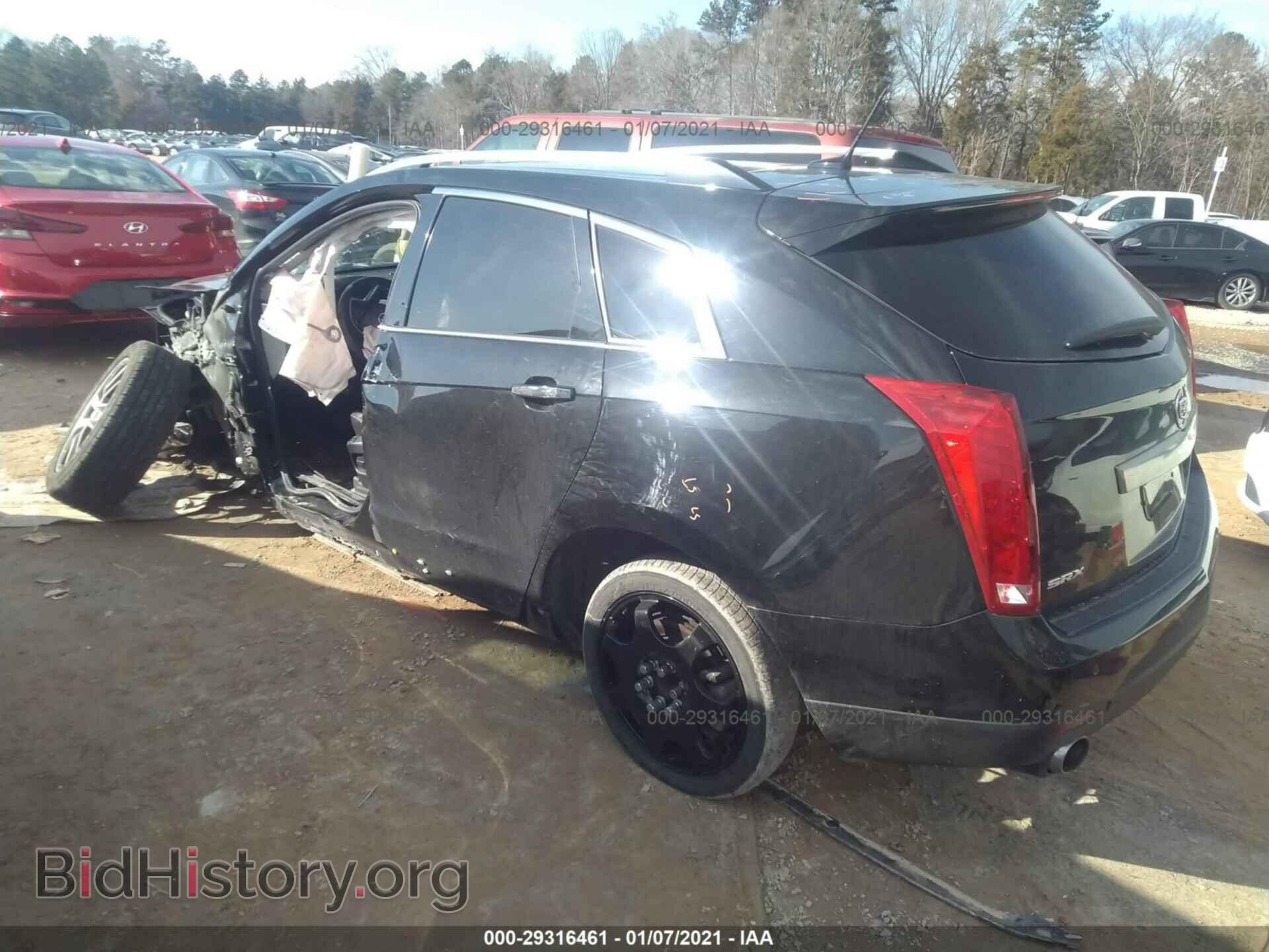 2013 CADILLAC SRX - VIN: 3GYFNCE32DS655365 - Фото 3