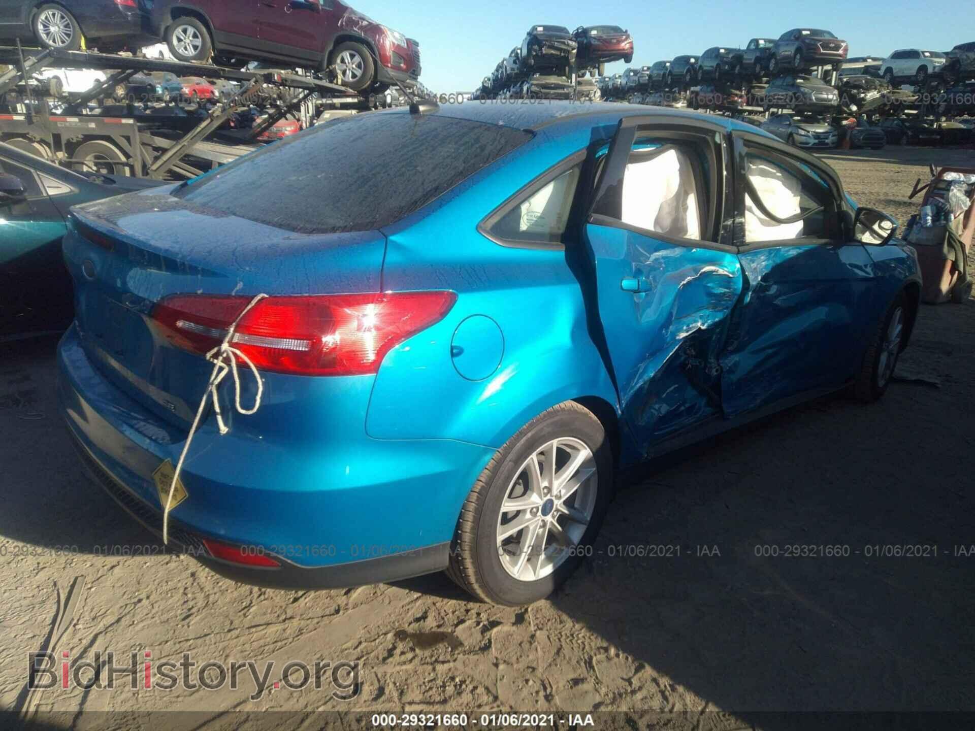 2017 FORD FOCUS - VIN: 1FADP3F21HL221419 - Photo 4